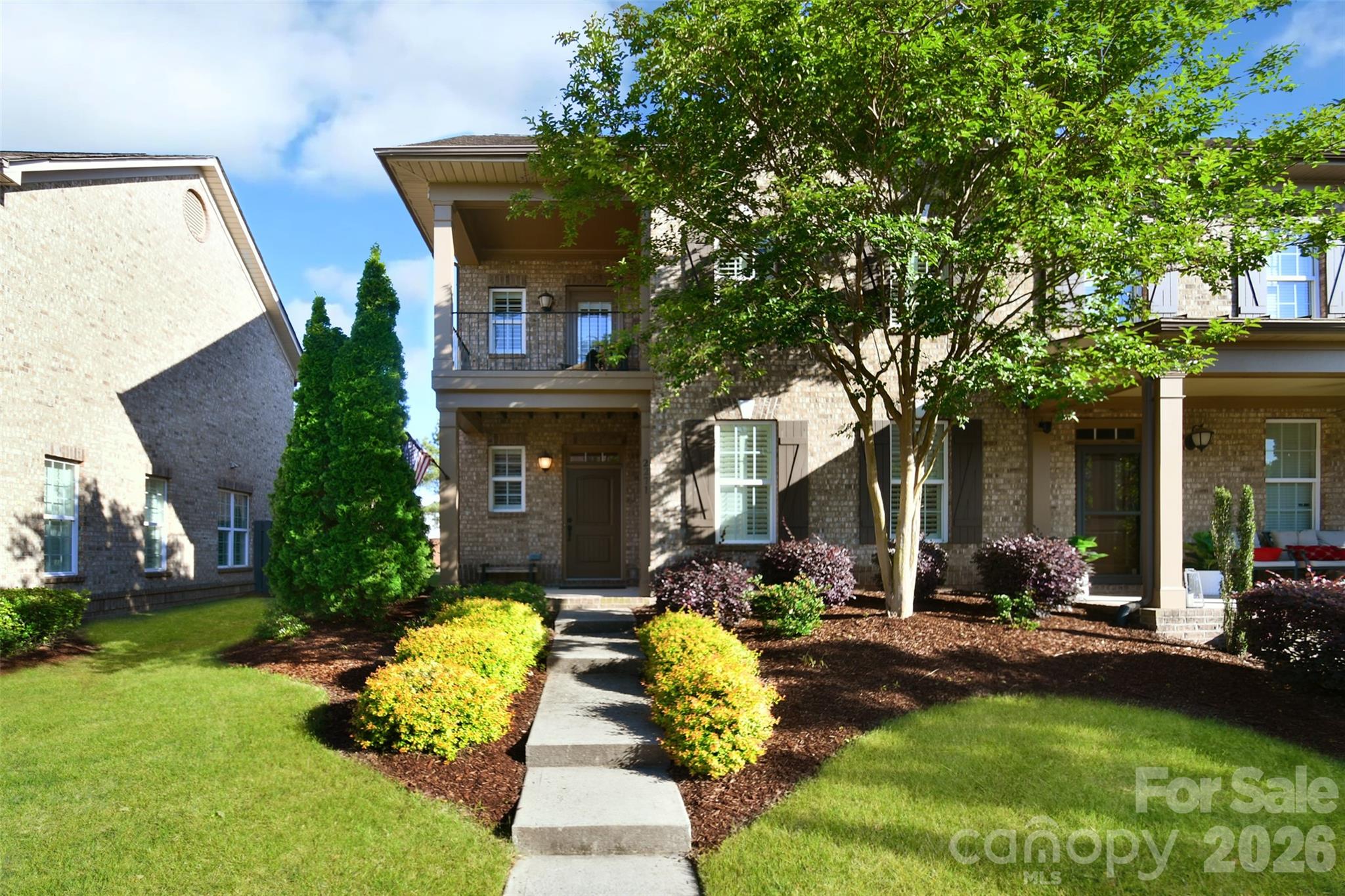 Step into easy, low-maintenance living in this charming two-story brick townhome tucked inside the sought-after Christenbury community. This spacious end-unit offers 2 bedrooms and 2.5 bathrooms and a loft, with extra windows that fill the home with sunlight and create an open, inviting feel throughout. The main-level primary suite adds everyday convenience and privacy, while the functional floor plan provides plenty of room for relaxing or hosting guests. Enjoy outdoor living on the fenced-in patio — perfect for sipping coffee in the morning, unwinding after a long day, or gathering with family and friends. Inside, the home features comfortable living spaces designed for both functionality and style.The ample main level laundry room, the upstairs walk-in storage, and the large rear-entry garage make this home a must-see!Christenbury residents have access to an impressive lineup of community amenities, including a resort-style pool, clubhouse, tennis and pickleball courts, basketball court, walking trails, and sidewalks ideal for evening strolls. Located within the highly rated Cox Mill school district, the property is also just a short walk from shopping, dining, coffee spots, Lowe’s Foods, pet services, and other everyday conveniences.This is a fantastic opportunity to own a bright, well-appointed end-unit home in one of the area’s most popular communities!