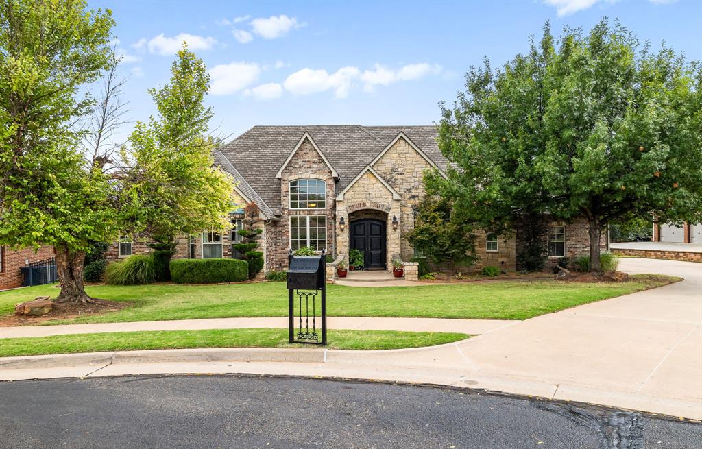 Welcome to Turtle Creek Estates, a private gated community offering plenty of trees, paved trails, and peaceful ponds. Bordering Martin Nature Park, residents enjoy a lifestyle surrounded by nature. This elegant home features 4 bed, 4.1 bath. Through the double-door entry, you'll find a stately office with built-ins and a formal dining room that flows into a wet bar-perfect for entertaining. The chef's kitchen boasts double ovens, a commercial-grade refrigerator, and a breakfast nook, all open to the living room with fireplace and built-ins. Just beyond, an additional living area offers flexible space for gatherings or a children's play/study area. The private primary suite includes spa-like bath and dual-head walk-in shower. Large walk-in closet. Just outside the suite is a large laundry room with abundant cabinetry and sink. On the opposite wing, 3 bedrooms offer comfort and versatility. Two sharing a Jack-and-Jill bathroom and the third with a closet that doubles as a safe room, paired with a nearby full bath. Upstairs, enjoy a second living space with wet bar, theater room, and craft room with closet. An additional bathroom adds convenience for guests. Step outside to your backyard retreat with a covered patio, sparkling heated pool, hot tub, and serene pond views. Set on a cul-de-sac lot, this property combines luxury, privacy, and natural beauty in one of the city's most peaceful neighborhoods.