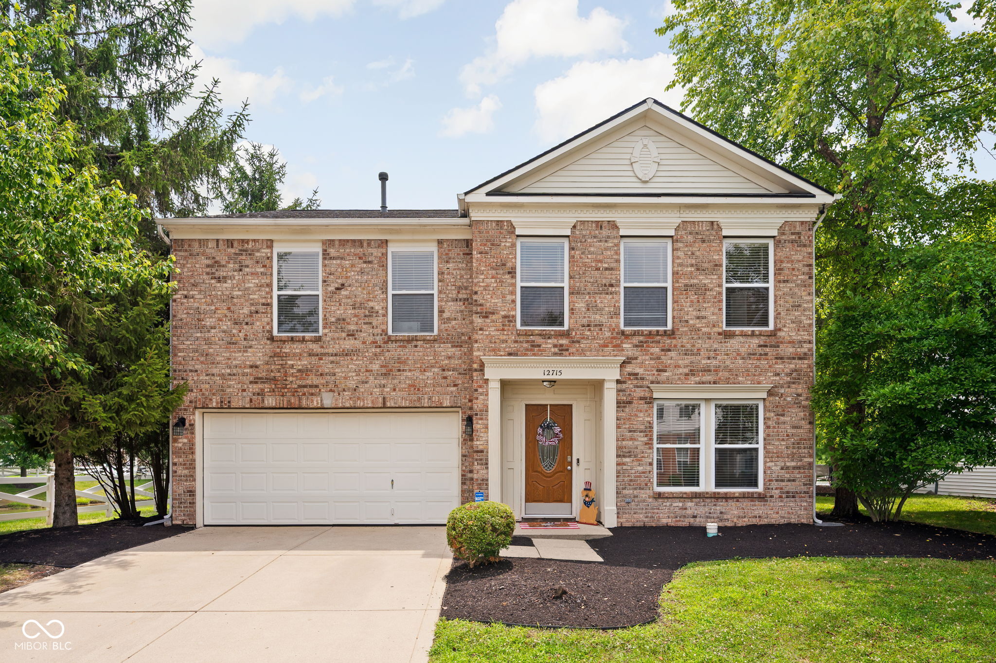 Welcome to 12715 Courage Crossing, a beautifully maintained home tucked on a desirable corner lot in Fishers' sought after Brooks Chase neighborhood. With no neighbors on one side and a peaceful pond view right off the backyard, this 2,950 sq ft home offers the kind of privacy and scenery that's hard to find.  Inside, you'll find 3 bedrooms and 2.5 baths, plus a spacious bonus/rec room loft, perfect for a second living area, media room, or playroom. Freshly painted interiors give the home a crisp, move in ready feel throughout.  Major systems have already been taken care of: both the furnace and A/C were replaced just 4 years ago, and the garage features a new opener.  The location is hard to beat: just steps from Hamilton Town Center's shopping, dining, and entertainment, minutes from Ruoff Music Center, and with quick access to I 69 for an easy commute. Ideally located in Fishers within the Hamilton Southeastern school district, this home combines comfort, updates, and a premium lot in one of the area's most established communities.