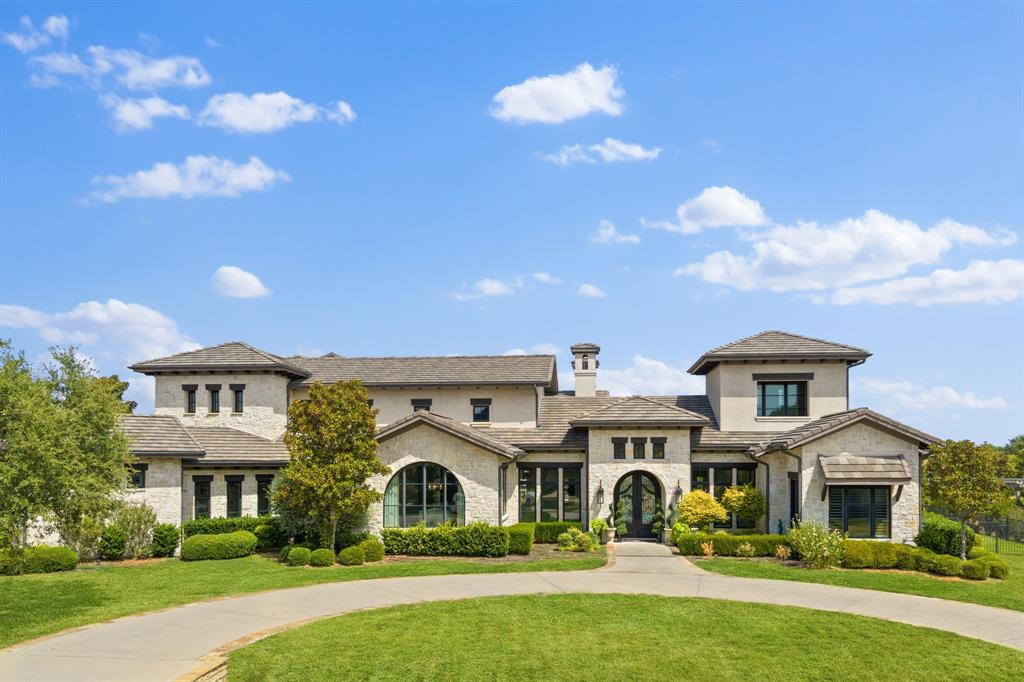 Extraordinary & rare custom villa with detached casita offering unparalleled luxury on a sprawling 1.128-acre private lot in Fairview! Bathed in rich natural light, the sophisticated floor plan features a grand entrance hall adorned with herringbone travertine and custom hardwood flooring. Work from home in the executive study featuring a cozy fireplace, private sitting area, and direct outdoor access. Designed for seamless entertaining, the main level hosts a grand dining room serviced by a butler's pantry, a dedicated wine room with a custom bar, a spacious family room, and a rare 1st-floor billiards room and home theater combination. The gourmet Chef's kitchen is complete with a walk-in pantry, generous island, custom cabinetry, and an oversized utility and mudroom. The exquisite primary suite offers a lavish, spa-inspired bath with a private loft retreat. Additional accommodations include a 1st-floor guest suite and 3 upstairs en-suite bedrooms paired with a game room, den, and private balcony. Step outside to an extraordinary outdoor living space featuring a crystal-clear pool with a tiled fountain, integrated spa, covered patio with fireplace, gated motor court, and an outdoor kitchen fully equipped with a built-in grill and authentic pizza oven. Luxury living at its finest!