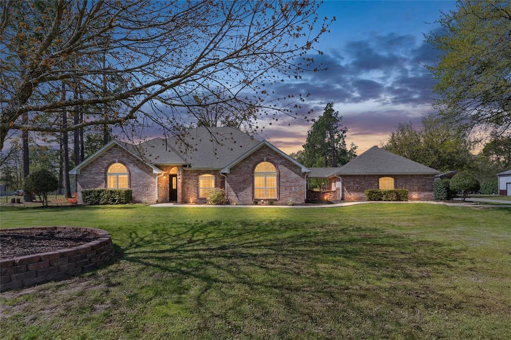 Take a look at this exceptional shady 2.8-acre estate with a 4-bedroom, 3-bathroom brick house with 20x30 workshop on a peaceful country setting! Drive through the elegant and gated brick-n-wrought-iron fencing. Inside, you'll find lots of space, quartz countertops, a breakfast bar, eat-in dining, walk-in pantry, and extra storage. From the oversized windows, enjoy views of the part-wooded, fenced backyard. The primary bedroom features double sinks with vanity area, garden tub, and separate shower. Additional upgrades are, updated bathrooms, above-ground pool, some new windows, 2020 HVAC, new sidewalk, kid's play set and a fire pit. Versatile landscape and outdoor space includes mature trees and an enclosed gazebo off the back porch.  Bonus features are a two-car garage and a carport. Additionally, a 20x30 metal workshop offers specialized storage for a tractor, boat, or working on hobbies. The exterior is designed for entertaining, featuring panoramic views. Ideally located near Sulphur Springs, this serene property represents an outstanding location!