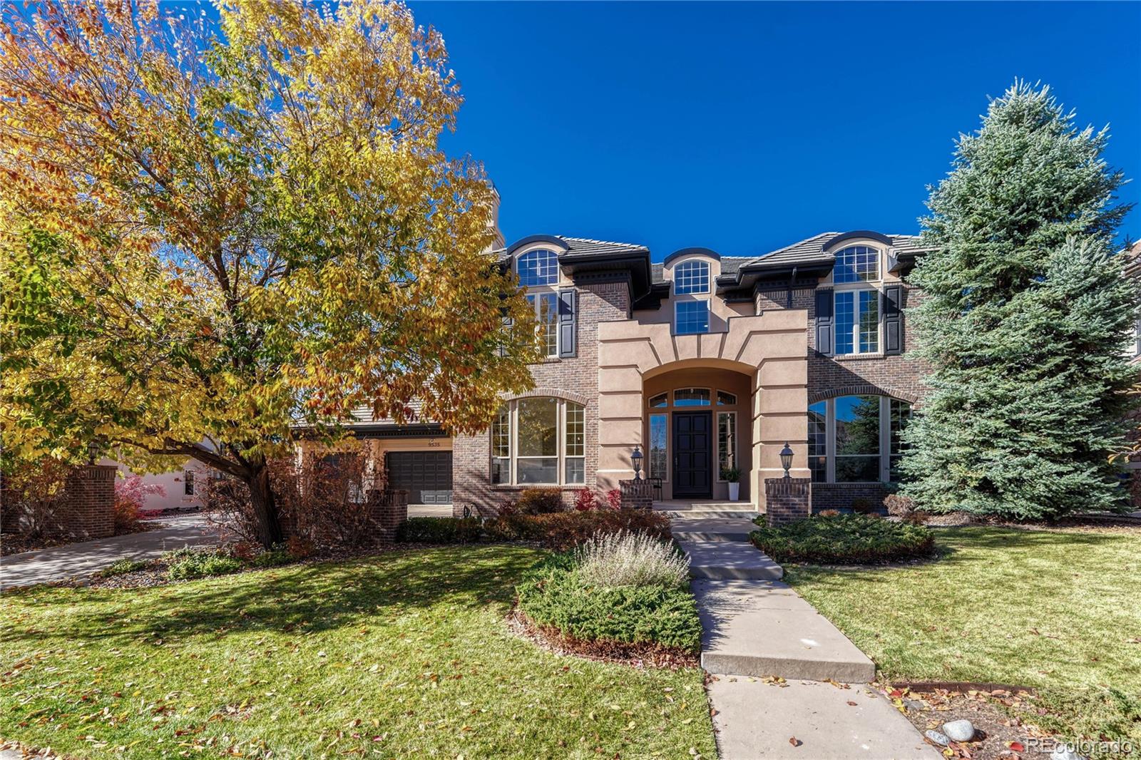 9535 Silent Hills Drive is now offered at $1.799M, creating one of the most compelling opportunities in the neighborhood.This adjustment creates a strong opening for buyers who value location, lot, and long-term upside without compromising on quality or lifestyle.Set within the prestigious gated community of Heritage Hills, this exceptional Celebrity Custom Home sits on a quiet cul-de-sac and offers timeless craftsmanship blended with refined modern updates. Soaring floor-to-ceiling windows, extensive hardwood flooring, and a dramatic wrought-iron staircase create a grand sense of scale and natural light from the moment you enter.The gourmet kitchen, featuring rich 42” cherry cabinetry, slab granite countertops, stainless steel appliances, a 5-burner gas cooktop, double ovens and an inviting island with breakfast bar and dining nook, is perfectly positioned for everyday living and elegant entertaining. The family room exudes warmth with wood accents, a gas fireplace, and slate details. A main-floor study with glass-pane doors and custom built-ins offers a sophisticated work-from-home environment.Every room has been thoughtfully refreshed with new paint, new carpet, updated lighting, and stylish new cabinet hardware, creating a polished and move-in-ready ambiance. The luxurious primary suite is a private retreat with a sitting area, fireplace, and spa-inspired bath. Three additional spacious bedrooms and two full baths complete the upper level.Outdoor living shines with a pergola-covered patio, built-in gas grill, and a generous yard, it's the perfect backdrop for quiet evenings and Colorado sunset gatherings. The garden-level, unfinished basement offers endless potential. Dual furnaces, dual A/C units and dual water heaters ensure year-round comfort.Experience elegant living in one of Lone Tree’s most coveted gated communities