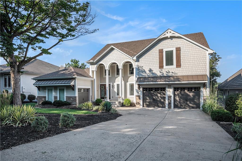 Welcome to this magnificent waterfront retreat on Lake Winnebago! This stunning 1.5-story home offers 4 bedrooms, 3.1baths, a 3-car garage, and over 5,200 square feet of beautifully finished living space. Step inside and be greeted bysoaring ceilings, floor-to-ceiling windows, and sweeping views of the lake. The semi-open layout features gleaminghardwoods and a dramatic stone fireplace that anchors the expansive formal living room. The elegant kitchen showcasesgranite countertops, stainless steel appliances, an island, and an additional seating area with its own stone fireplace—perfect for both everyday living and entertaining. The main-level primary suite is a private oasis with a jetted tub, walk-inshower, double vanity, custom closet, and even a three-sided fireplace. Upstairs, a spacious loft and oversized bedroomwith updated bath provide extra comfort. The lower level is designed for fun and relaxation, offering high ceilings, afamily room with fireplace, wet bar, kitchenette, and two additional bedrooms connected by a Jack & Jill bath. Stepoutside to enjoy the 3-tier deck with spectacular lake views, or head down to your new extra-wide boat dock withhydraulic lift. This home has recently undergone a $250,000 exterior renovation including new Hardy siding, 43 newlakeside windows, new roof, and new gutters—leaving nothing to do but move in and enjoy! Ideally located onSouthshore Drive, this tier-1 lot ensures unobstructed views with no homes across the street—just peace, privacy, andwater all around. Add in the incredible amenities of the Lake Winnebago community, and this home truly has it all. Comesee why this rare lakefront gem is the perfect blend of luxury, comfort, and lifestyle. Home is priced lower price persquare foot than many updated lake front properties.