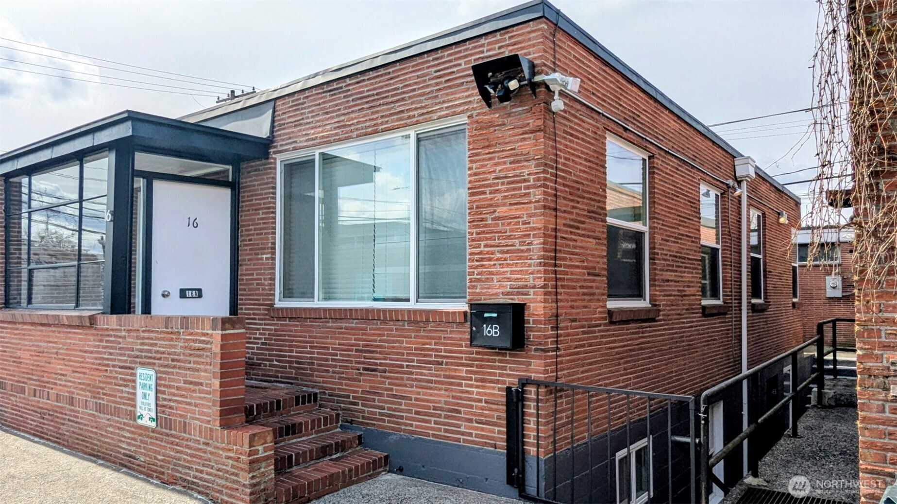 Exceptional Turn-key, Mid-Century property in the Hip Hilltop District (Tacoma's future Belltown)! Rare mixed-use zoning (Res/Retail/Com), located in one of the fastest growing parts of Tacoma!  Walking Distance to Everything: Light Rail Station, Restaurants, Coffee Shops, Hospitals, Grocery Stores, UW & Parks!  Lower unit with two bedrms, one bath 800sqft, features Full Remodel w/ brand new Kitchen, Bath, Flooring, Paint, Cabinets, Quartz counter tops, Appliances and More! Main floor w/ two bedrms, extra finished rm & 1 bath 800 sqft (remodeled in 2006)! Affordable, Excellent condition and Rare opportunity to live in one side and rent the other!