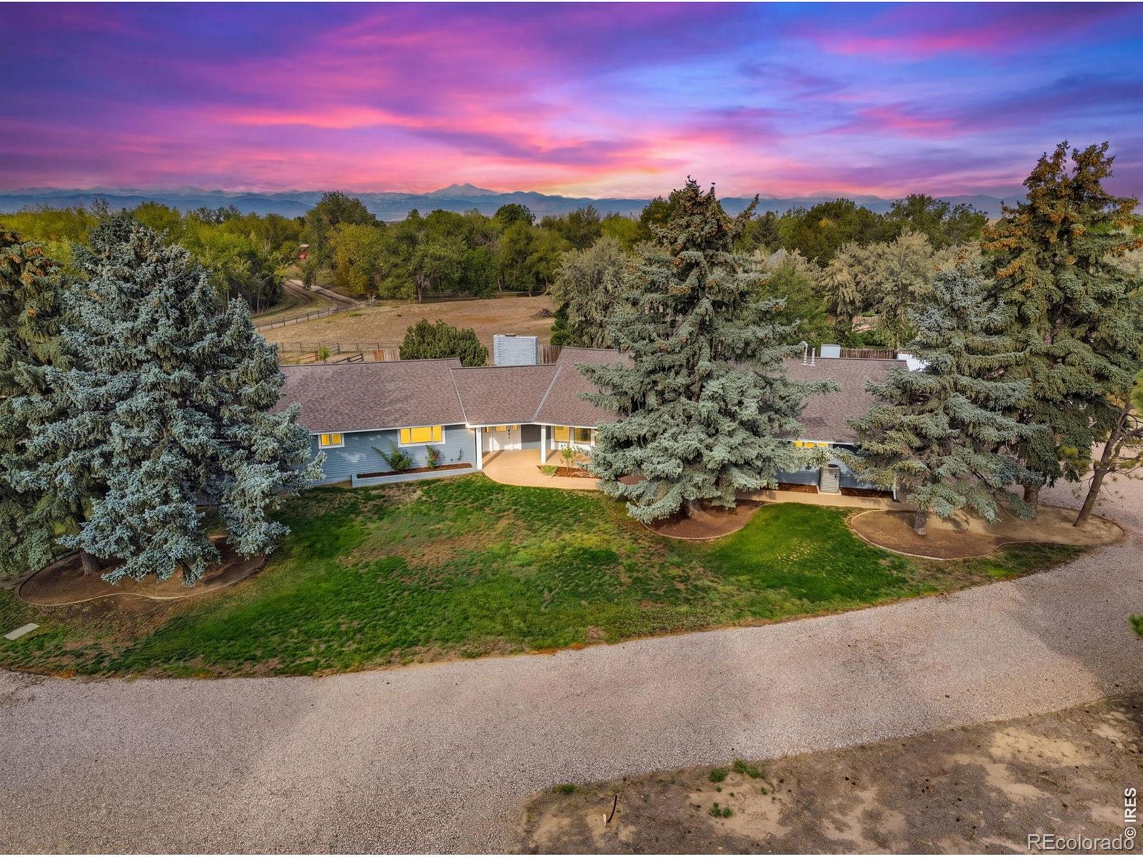 Enjoy the space, privacy, and versatility of country living on 1.67 acres in Mead! This inviting brick ranch offers 4 bed, 3 bath, 2-car attached garage, separate living and family rooms, each w/fireplace, a dedicated dining room, and large windows that fill the home with natural light. The spacious primary suite provides a relaxing retreat with a remodeled bathroom and walk-in closet, while a covered front porch creates a welcoming entrance and the covered back patio is the perfect place to unwind in the evening, entertain friends, or simply enjoy the peaceful setting and mountain views. Outside, the large fenced yard with sprinkler system offers plenty of room for gardeners, hobbyists, car enthusiasts, animal lovers, and anyone wanting more elbow room. A garden shed sits conveniently just off the garage, while the spacious shop (25'X45'), provides exceptional room for projects, vehicles, toys, or equipment. You'll also find a lean-to for protected equipment storage and a loafing shed with animal stalls, adding even more flexibility to the property. Located in Mead, you can enjoy the town's small-town atmosphere and rural character while remaining connected to Front Range amenities and St. Vrain Valley Schools. If you've been looking for acreage, mountain views, room for animals, serious shop space, and a home where you can spread out and make the property your own, this one delivers!