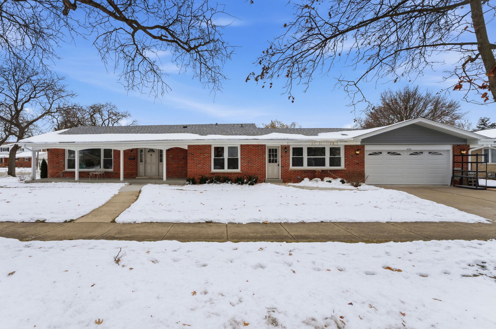 SHOWINGS BEGIN AFTERNOON ON MONDAY DEC 22nd. Welcome to this beautifully remodeled brick ranch situated on a quiet, tree-lined corner lot in highly sought after Park Ridge. Completed in 2025, this move-in-ready home offers over 3,300 square feet of finished living space, thoughtfully designed for comfortable everyday living and flexible use. The main level features four bedrooms, including a primary suite with an updated en-suite bathroom. Refinished flooring throughout the main floor enhances the home's sun-drenched rooms, while the functional layout provides both openness and separation where it matters. The dining area sits conveniently off the kitchen. The finished basement significantly expands the living area, offering a large recreation room, den (ideal for a home office, playroom, or workout space), and abundant storage. The attached 2-car garage provides everyday convenience. The corner lot setting allows for added privacy and easy-to-maintain landscaping. Located on a peaceful residential street, the home is just minutes from top-rated Park Ridge schools, parks, Metra access, Uptown Park Ridge dining and shopping, major expressways, and O'Hare International Airport. With its solid brick construction, recent updates, and prime location, this home offers a rare combination of space, function, and convenience, truly move-in ready and not to be missed.