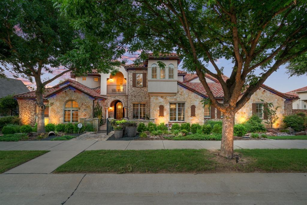 A RARE OPPORTUNITY! Stunning Golf & Lake Views in Castle Hills! Welcome to some of the most breathtaking views in the N Dallas area! This luxurious Custom Home is nestled within the EXCLUSIVE GUARD GATED COMMUNITY of Enchanted Hill! Every room in this exquisite home offers spectacular lake views, creating a sense of tranquility and elegance throughout. The exceptional floor plan includes a grand courtyard, a stunning foyer, and elegant dining room. The Chef’s kitchen is a masterpiece, equipped with top-of-the-line Subzero and Wolfe appliances, while the fabulous family room and large breakfast area provide plenty of space for relaxation. For entertainment, there are two game rooms, a spacious game room on the main level as well as another upstairs currently being used as a card room with a wet bar, perfect for entertaining! The large tiered media room doubles as an exercise room. The expansive 22x16 balcony off the game room offers panoramic views of the lush golf course and serene lake, making it an ideal place to unwind. The luxurious master suite is a true retreat, with a sitting area, spa-like bathroom, and a custom-designed walk-in closet. All other spacious bedrooms feature en-suite baths, ensuring ultimate comfort for family and guests. Step outside into your own Outdoor Haven, where you'll find a spacious loggia with a fireplace, a built-in grill, refrigerator, along with multiple areas for relaxation and entertainment.  Enjoy a sparkling pool, spa, firepots with water features, a firepit, lush grounds, and beautifully landscaped gardens. Additional features include the primary suite and two additional bedrooms on the main floor, an additional wet bar off the kitchen, a Spacious home office, wine room, plantation shutters, electric shades, imported lighting fixtures, and a 4-car garage. This extraordinary home offers a rare opportunity to live in luxury with unparalleled views and top-tier finishes. Don’t miss out on this once-in-a-lifetime opportunity!