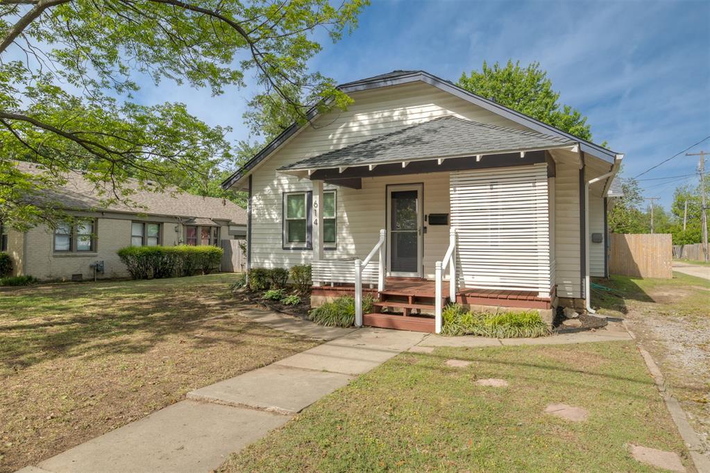 Welcome to 614 N University Blvd in the heart of Norman just blocks away from OU's campus. This charming 2-bedroom bungalow features a beautifully updated and fully remodeled kitchen, offering a fresh, modern feel with thoughtful finishes throughout. The true showstopper is the stunning island, complete with sleek waterfall edges. The bathroom has also been completely updated and features modern functional finishes. The sellers are including an almost brand new refrigerator and washer/dryer combo. PLUS the laundry location is indoors. Throughout, you will find real hardwood floors which beam with character and warmth. A new water heater was installed in 2025.Speaking of entertaining—this home is ideal for hosting friends before OU game days. With its unbeatable proximity to campus, you can enjoy the energy of game day without the hassle of long commutes or parking struggles.Step outside to a spacious backyard filled with mature shade trees, creating a relaxing retreat perfect for gatherings, pets, or simply unwinding after a long day. The back yard also features a new deck built with materials to weather the years and a storage shed for all your gardening needs. Located just minutes from the University of Oklahoma and all that central Norman has to offer, this home combines convenience, character, and modern updates in one incredible package.Don’t miss your chance to own a home in one of Norman’s most desirable locations and a well-kept quiet block. Priced to sell! Schedule your private showing today.