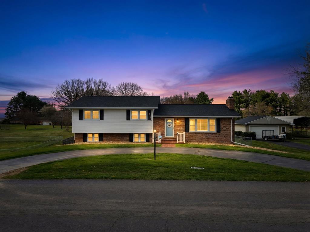 Welcome to this inviting and well-maintained home nestled in the highly desirable Westwood neighborhood of Abingdon Virginia. Offering a blend of comfort, functionality, and outdoor charm, this property delivers everything you need for easy everyday living with room to grow. This spacious 3-bedroom, 2.5-bath home features a thoughtful layout designed to accommodate a variety of lifestyles. The main level includes a bright and comfortable living area that flows seamlessly into the dining space and kitchen, creating an ideal setting for both daily routines and entertaining. The primary bedroom is a true retreat, complete with its own private ensuite bathroom, providing convenience and privacy. Downstairs, the finished basement expands your living possibilities, perfect for a family room, home office, recreation space, or guest area. The basement also includes a half bath, adding extra practicality and comfort for gatherings or extended stays. A one-car garage offers secure parking and additional storage, while the outdoor space is where this property truly shines. The fully fenced backyard provides peace of mind for pets and children, and the property offers plenty of room to enjoy the outdoors. A well-built storage shed adds even more functionality, ideal for tools, hobbies, or seasonal items. Gardeners will appreciate the dedicated garden area, ready for vegetables, flowers, or landscaping projects. Located in the established Westwood community, this home offers a quiet residential setting while still being just minutes from Abingdon's schools, shopping, dining, and I-81 access. It's a wonderful opportunity to own a comfortable, move-in-ready home with valuable indoor and outdoor features.