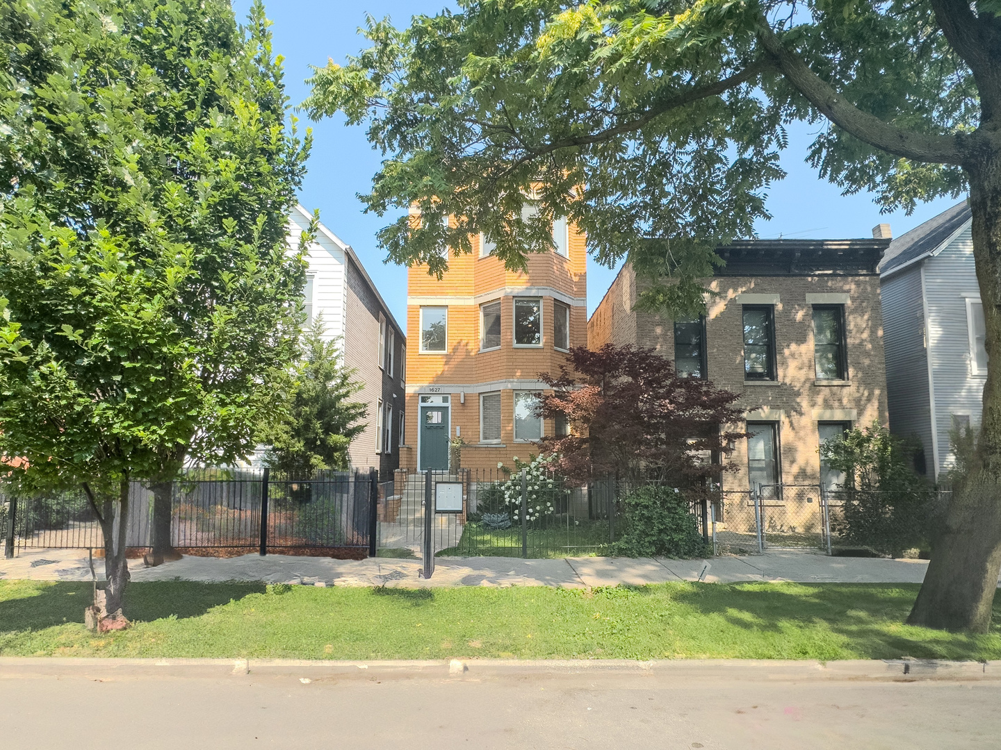 New to market! Nestled in the heart of West Bucktown and East Humboldt Park, this all-brick 2 bed / 2 bath condo offers the perfect blend of style, function, and location. Enjoy gated parking (included) and your own private outdoor space in a charming, 100% owner-occupied 3-unit building with fantastic curb appeal and beautifully maintained landscaping. Inside, you'll be welcomed by tall ceilings, sun-drenched west and south-facing windows, and move-in ready finishes throughout. Features include hardwood floors, a cozy fireplace, stainless steel appliances, and fresh paint-ready for the next person to carry the homeowner torch. Ease of ownership for years to come with a new roof in 2024, HVAC 2 years young, newer water heater, and recent tuckpointing. With low HOA dues of just $185/month and private storage in the lower level, this home is an easy yes. Just steps from the 606/Bloomingdale Trail, Humboldt Park, Cermak Grocery, and a short stroll to Wicker Park, Logan Square, and countless transportation options.