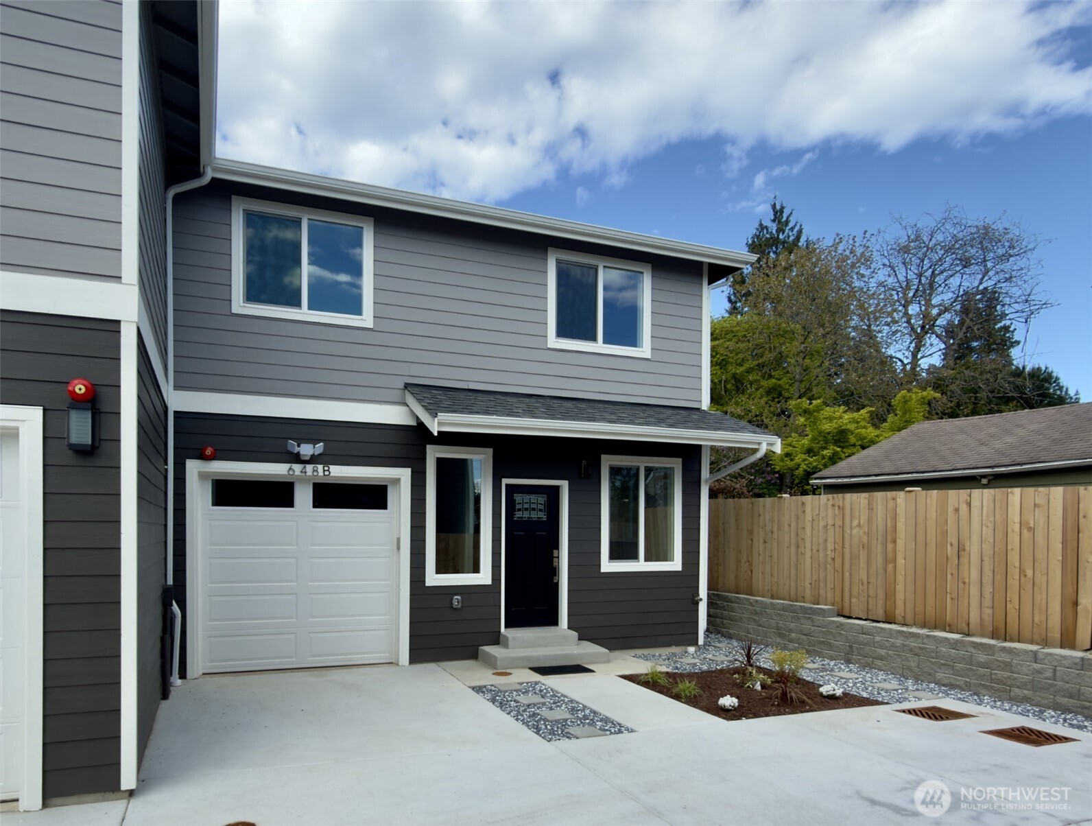 Beautiful New Construction in a great neighborhood! This 2bd, 2.25ba home has a kitchen that boasts SS appliances, quartz countertop & center island. Open to the living area, it's a chef's dream! Half bath downstairs and a small yard area behind the home. Upstairs is a lovely en-suite primary bedroom with 5 piece bath. A second bedroom, full bath and utility closet with stackable washer & dryer.  An amazing THREE deeded parking spaces for this unit.  All appliances are already installed and no King County Metro Sewer Capacity Charge.  This is a FANTASTIC VALUE for new construction.  An amazing THREE deeded parking spaces for this unit. Easygoing HOA. Rentals & pets ok.
