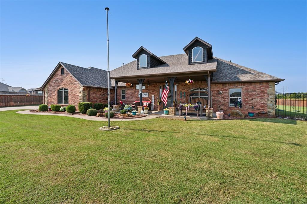 Welcome home 18302 Stagecoach Trail, Norman Ok, 73072. Tucked away on a quiet corner cul-de-sac 3/4 lot in the sought-after Land Run Addition with a great neighborhood pool. This beautiful home offers amazing curb appeal with its large front porch and oversized side load garage with peaceful country living just minutes from Norman, OU, and Riverwind Casino. This well-maintained home features 3,220 sq ft of living space with multiple spacious living areas designed for both relaxing and entertaining. The open-concept main floor boasts a bright, airy layout with large windows, tall ceilings, and a cozy fireplace dedicated office. The kitchen includes all top-of-the-line appliances, granite counters, island features a prep sink w/garbage disposal, making cleaning up after a fun evening a breeze, and a casual dining nook that overlooks the expansive backyard. The private primary suite features a spa-style bath with dual vanities, soaking tub, walk-in shower, and a generous closet. Upstairs features an oversized bonus room, with access to a full bath, this large bonus living space perfect for a game room, theater, or flex space. Outside, the property includes a large covered patio with wall mounted TV and motorized screens to enclose the entire patio, fully insulated 20x30 shop w/added 12x20 2nd side to the shop with 220 RV hookup, painted floors, overhead doors, and endless potential for hobbies, storage, or work. Situated on 0.73-acre lot with full irrigation system, fencing, gutters, year-round seasonal holiday lights, and a recently replaced roof, this home offers space, upgrades, and location. Easy access to shopping, dining, and major highways, yet set in a quiet, established neighborhood with pride of ownership. Schedule your showing today!