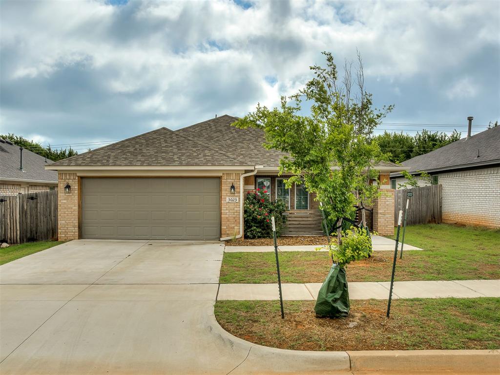 SELLER OFFERING 2-1 INTEREST RATE BUY DOWN WITH PEFERRED LENDER. Stunning Contemporary style 3-bedroom home located in Greenleaf Trails. The kitchen boasts beautiful quartz countertops, stained wood cabinetry, stainless steel appliances with gas range, and large island/eating surface. The spacious open living/dining layout is great for entertaining! The split floorplan allows privacy between the primary suite and secondary bedrooms. You'll love the large utility room with folding surface and ample storage, along with the convenient drop zone by the garage for coats, bags, and shoes for those on the go! Hang out on the covered back patio that overlooks a nice sized fully fenced yard! Greenleaf Trails offers a playground, splashpad, fishing pond, and picnic areas for further enjoyment.