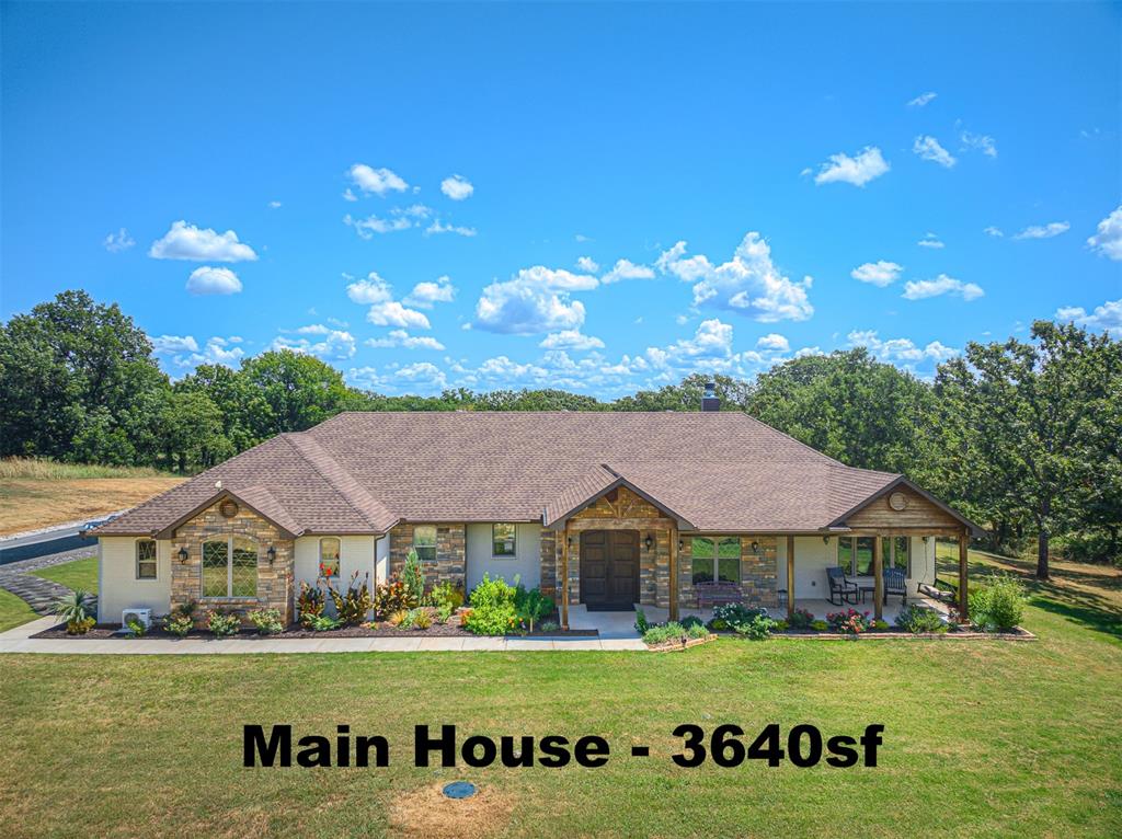 TWO HOMES ON 12 ACRES!!  One of a kind 4 year old, incredible custom country Tudor Style home in East Norman, OK on 12.53 acres.  The personal home of a builder, every detail was addressed for comfort in a discerning style of country living.  The listed total living space square footage for both houses is 4794.  The main house is 3640sf with 3 beds &  2.5 baths. This beautiful home gives an exceptionally warm feeling as soon as you enter with large rooms and tall ceilings throughout, gourmet kitchen offering 7 burner ZLine gas range with double ovens and a 6' x 16' pantry, wood burning fireplaces in the living room and on the 20' x 21' screened in back porch, additional screened porch with private access from bedroom #2, above ground storm shelter in garage, 5 storage buildings, so many extras that we listed them in the last photo of the pictures. Enjoy organic gardening in the raised beds on the enormous back deck where you can enjoy the fire pit, fountain and pergola. Stand on one of 2 docks of this stocked pond (Catfish, bass, crappie, blue gill, sunfish) and watch them eagerly come to the automatic feeder.   The darling guest house is 1154sf with 2 beds & 2 baths for guests or mother-in-law with an incredible view of the pond and docks from the 10' x 32' screened-in back porch.  Property has plenty of room for horses or other farm animals.  No HOA!  Noble schools, 20 minutes to OU campus, 40 minutes to downtown OKC, and 30 minutes to Tinker Air Force Base.  This is an amazing property waiting to make memories with it's next owner.