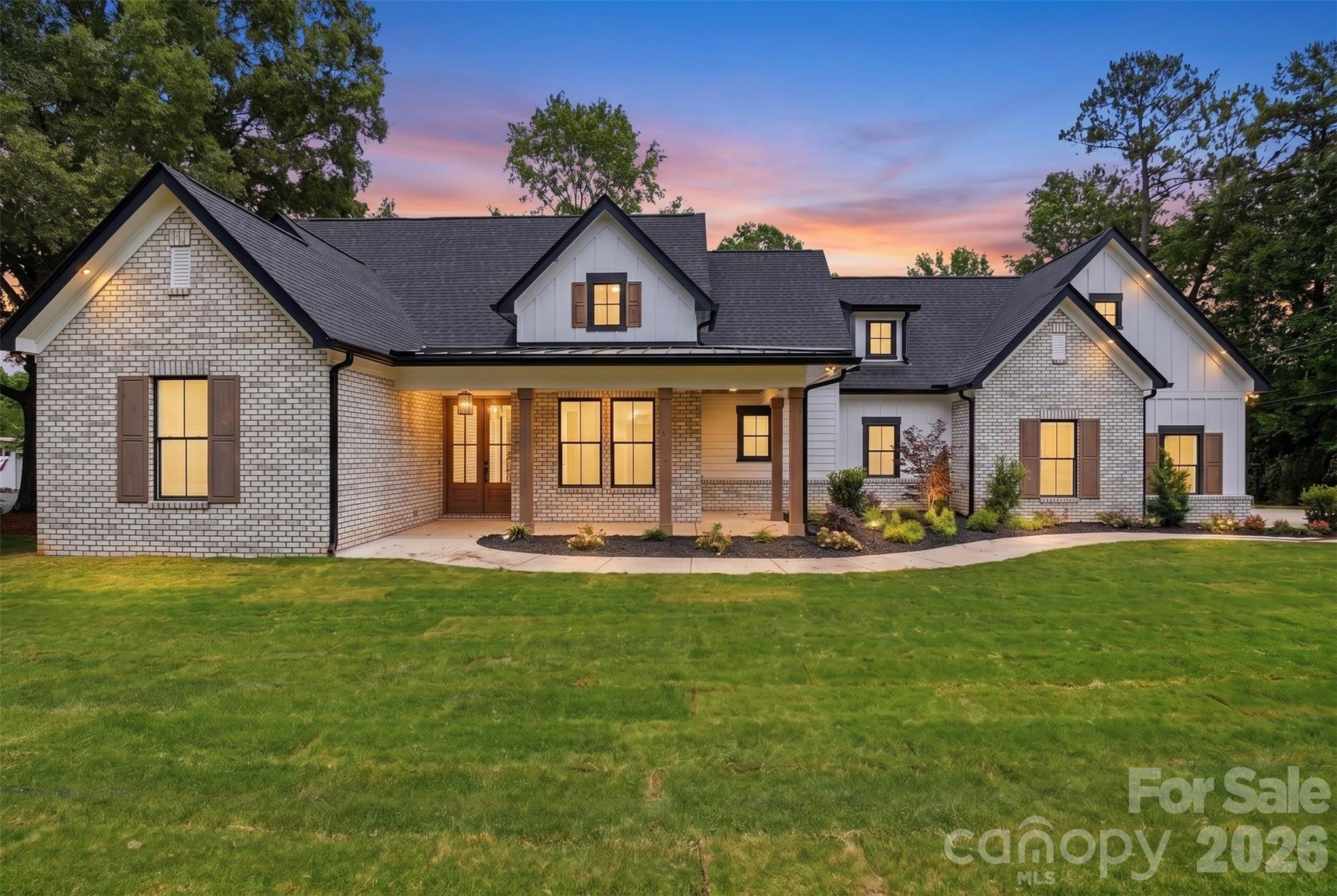 Welcome to 540 Rocklyn Drive, a truly custom luxury home by W.C. Jones Custom Homes LLC, where exceptional craftsmanship, thoughtful design, and upscale finishes create a home that stands apart from typical new construction. Situated on a generous 0.82-acre homesite, this stunning residence offers over 2,200 heated square feet with 3 bedrooms, 3.5 bathrooms, and a spacious bonus room with a full bath that can easily serve as a fourth bedroom, guest suite, media room, or flexible living space.From the moment you enter, you'll appreciate the attention to detail, highlighted by soaring 10-foot ceilings, a dramatic 14-foot vaulted ceiling in the living room, and a gas fireplace that anchors the open-concept living area. Designed for both entertaining and everyday living, the chef's kitchen is a showpiece featuring ceiling-height cabinetry, under-cabinet lighting, and a premium appliance package with elegant brushed gold accents. A 36-inch refrigerator with ice maker, 48-inch six-burner gas range with griddle and dual electric ovens, convection microwave, vented hood, and dishwasher combine beauty and performance in the heart of the home.The luxurious primary suite offers a spa-inspired retreat with a zero-entry tiled shower, while custom wood shelving throughout the closets and pantry adds both style and functionality. Additional upgrades include upper cabinetry in the laundry room, Delta plumbing fixtures, and thoughtful storage solutions throughout.Built with quality and longevity in mind, this home features LP SmartSide siding, a sealed conditioned crawl space with dehumidifier, Rinnai tankless gas water heater, 15-SEER HVAC system with gas furnace, hardwired Ethernet connections in the bedrooms, living room, office, bonus room, and covered back porch, along with 30-year GAF architectural shingles.Outdoor living is equally impressive with expansive covered front and rear porches that provide the perfect setting for morning coffee, evening gatherings, or simply enjoying the privacy of the large homesite. An oversized two-car garage and professionally installed Bermuda sod complete the property.Every detail of this home reflects the level of craftsmanship and personalization that defines a truly custom build. Luxury, comfort, and quality construction come together in a home designed to be enjoyed for years to come. This is a rare opportunity to own a custom-built masterpiece by W.C. Jones Custom Homes.