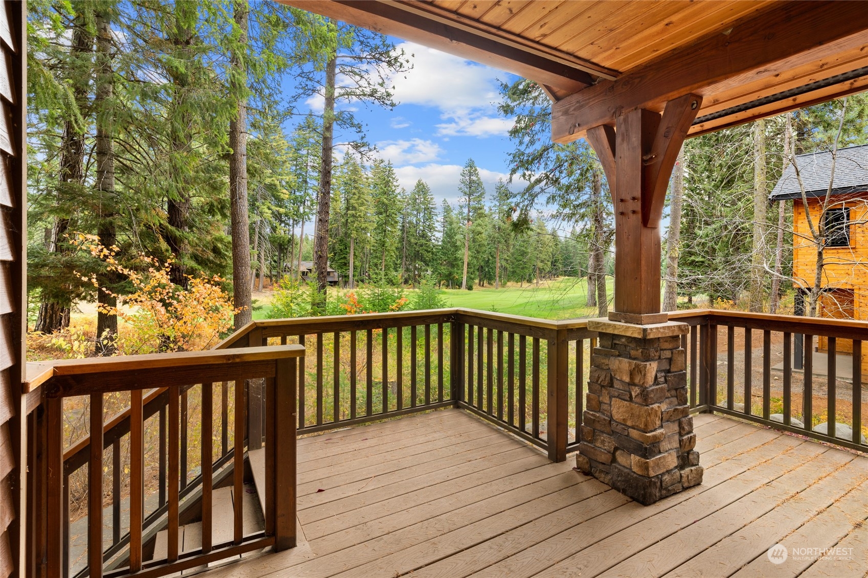 Covered deck with open views down the fairway of hole number 2