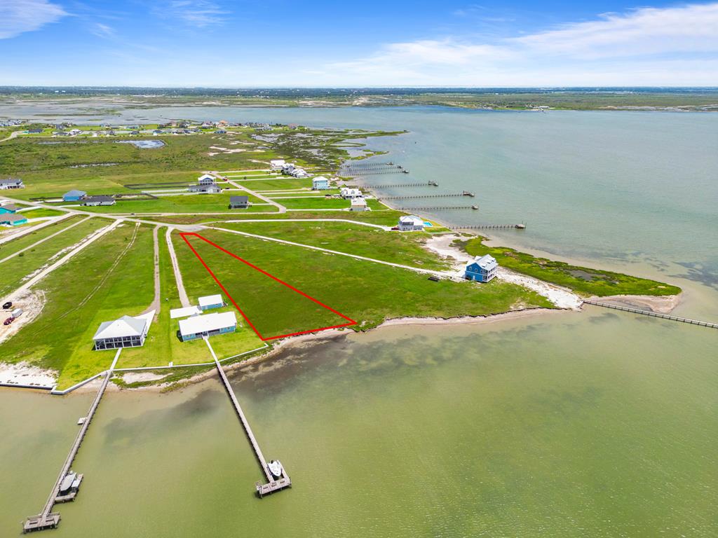 Fabulous 1.643 acre waterfront homesite overlooking Port Bay in the exclusive New Pelican Point development in Cape Velero. Imagine your dream home and private pier combining breathtaking forever waterfront views and one of the most tranquil coastal lifestyle settings in the area. Property has 180' of water frontage. Residents have access to a private boat launch, public water and electricity is available, septic system is required. Come be a part of this beautiful community.  There is a minimum house size of 2,100 square feet. HOA Restrictions and Bylaws are available.