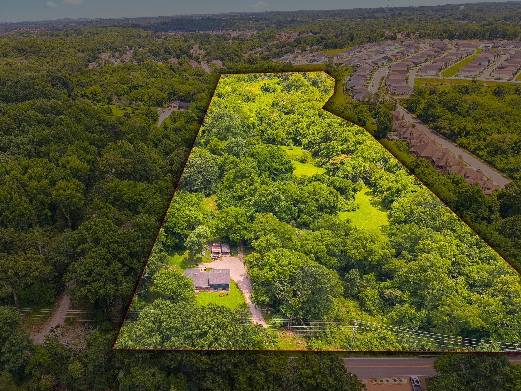 Discover this Davidson County gem: 14 acres available for under $1 million. Conveniently located minutes from the airport, hospital, and shopping, this former family farm presents an opportunity for a revitalized farm venture or for a future development. Pricing reflects the portion of the subject property acreage in the flood plain.