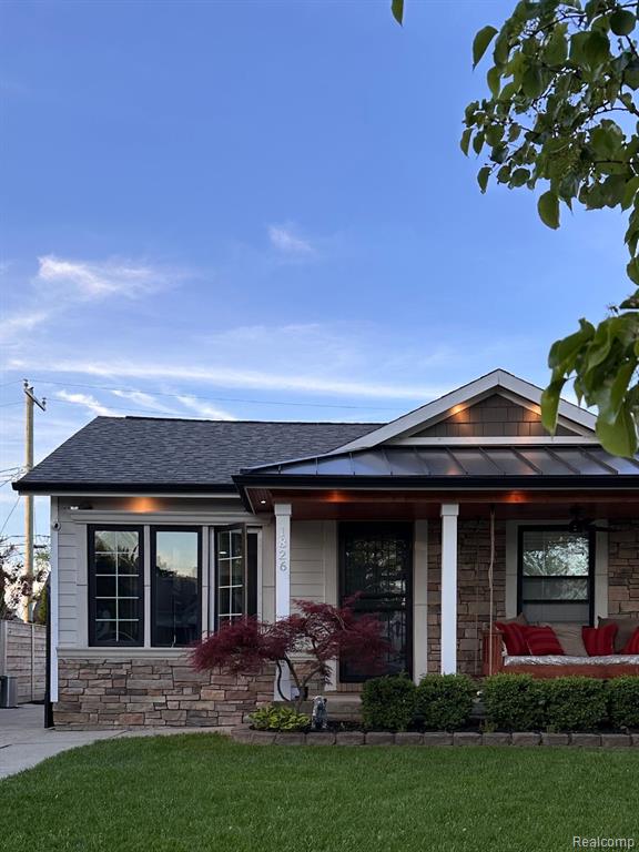 A beautifully updated gem in the heart of Lincoln Park! This charming home was fully renovated in 2023 with no detail overlooked. Updates include a new roof, furnace, windows, electrical, and plumbing – all designed to offer peace of mind and modern comfort. The stunning kitchen is a showstopper, featuring quartz countertops, a dramatic 9-foot waterfall island, and sleek modern finishes throughout. Gorgeous refinished hardwood flooring flows through the main living areas, complemented by a cozy fireplace and an adorable loft addition that adds unique character and charm. Exterior upgrades include durable Hardie board siding and Azek trim boards for a polished look. The updated two-car garage offers bonus overhead storage with convenient staircase access. This turnkey home blends contemporary upgrades with timeless style – truly a must-see!