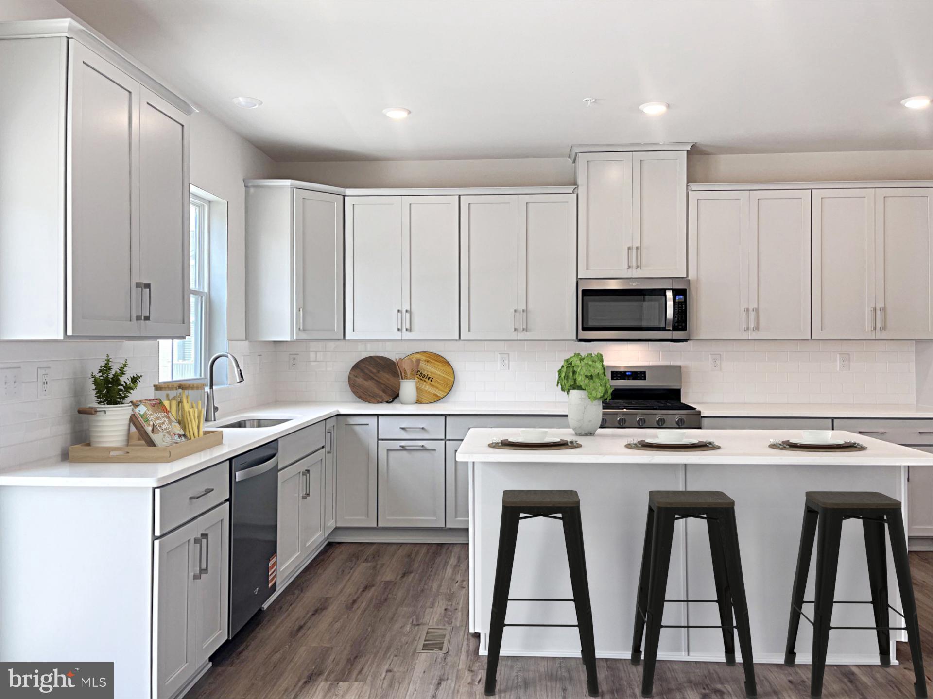 **MOVE-IN READY! NEW CONSTRUCTION WITHOUT THE TYPICAL WAIT!** Experience modern living in stylish new townhomes, just minutes from vibrant downtown Phoenixville and with direct access to the scenic Schuylkill River Trail—perfect for those who love an active lifestyle! 202 Bronze Street is a move-in ready new construction home showcasing the sought-after Cambridge floorplan. The first floor offers a spacious recreation room, ideal for entertaining, relaxing, or even setting up your home office (as seen in the photos!). This rec room is complete with a half bath and access to the 2-car garage. The main level showcases an open layout that seamlessly connects a large Great Room, a sleek kitchen with a stainless steel counter-depth side-by-side refrigerator, and stunning finishes like 42" white cabinets, carrara white quartz countertops, and a white subway tile backsplash. The bright dining area leads to a large deck, perfect for indoor-outdoor living. Upstairs, you’ll find all three bedrooms, offering a peaceful retreat and maximum privacy. The owner’s suite features a private bathroom for your comfort. A convenient two-car garage completes the package, combining both style and functionality. What makes this home even better is the direct access to a courtyard in front of the home and it's just steps away from the community dog park for all those dog lovers out there! This home is nearing completion so come see it today!Note: Model homes are open and ready to tour. Prices, dimensions, and features may vary and are subject to change. Photos are for illustrative purposes only - please see new home consultant for final options and finishes. If you’re working with a Realtor, please ensure they are acknowledged as your representative during your first interaction with Lennar and accompany you on your first visit. Taxes are assessed after settlement. For open house access, please visit the sales trailer.