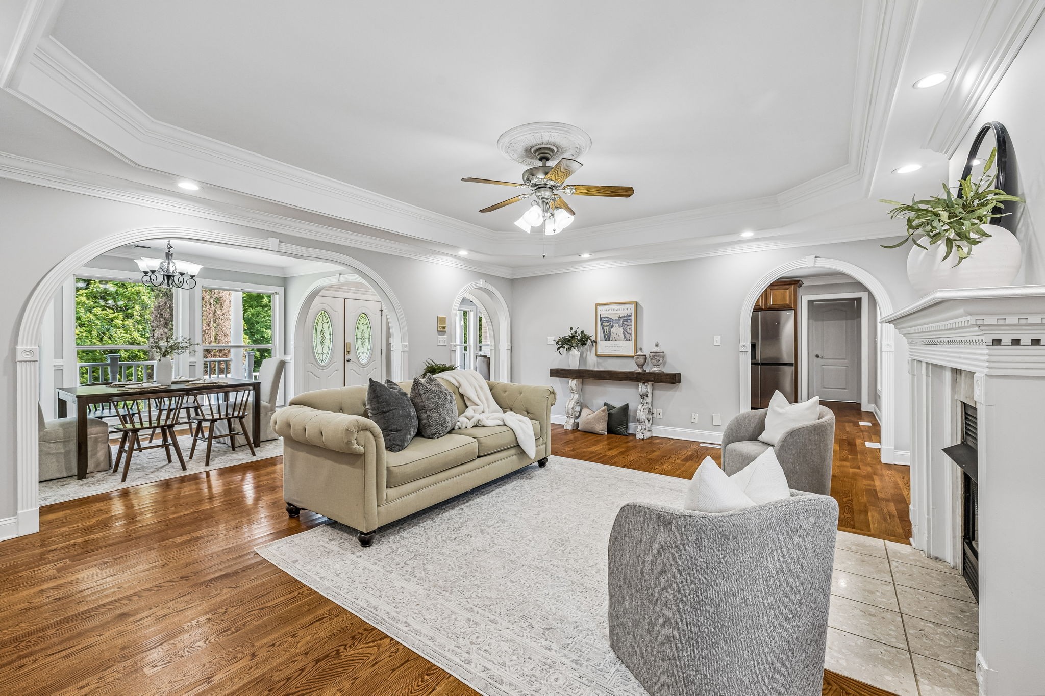 Beautiful, well-maintained all-brick custom home on 1.24 private, tree-lined acres with a country view, 4 minutes to I-24. Approx. 3,400 sq ft of quality craftsmanship featuring crown molding throughout, central vacuum, intercom, trash compactor, 2 fireplaces, fresh paint, and brand-new carpet. A grand entrance welcomes you with a lighted staircase; the oversized master suite offers its own fireplace and a spa-style bath with soaking tub and oversized walk-in shower. Unwind in the sunroom with fireplace or on the large covered porch overlooking the grounds. Outside is a true backyard oasis: in-ground pool (10 ft deep) with slide, fountains, cover, and stone surround, plus a full pool house with shower, toilet, sink, fridge, and changing room. Brand-new deck off the back, beautifully landscaped grounds, oval driveway with roundabout, ample parking, and a 500 sq ft storage shed that conveys. Pool is chlorine with the option to convert to saltwater and add heat in the future. Bonus: expansive walk-up attic already roughed in with sub floor, plumbing, water, and electric — just needs drywall to finish 1,000+ additional sq ft. Your dream country oasis awaits — schedule your showing today!
