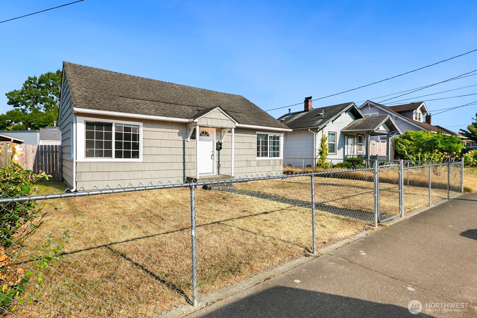 Imagine…owning one of the best deals currently on the market. You won't need a punch list of fixes when you move in because they've already been done, and the large backyard and alley potentially leave room for a future detached accessory dwelling unit (DADU - buyer to verify). It's move-in ready now, with future potential built in. Inside, you'll find an updated kitchen with 2 bedrooms and an updated full bathroom. Newer plumbing, insulation, and a new hot water heater mean the systems are sorted, so you can focus on making it yours instead of fixing what's broken. You step out back into a fully fenced yard, great for morning coffee, with room for the dog to run or a garden bed to take root. The exterior was just painted, with new siding on the south wall. There's also a detached one-car garage, plus off-street parking off the alley. You get all of this while being a 9-minute walk from Renton Memorial Stadium, a 4-minute drive from The Landing's shops, restaurants, and entertainment, a 6-minute drive from Boeing's Renton plant, and 2 minutes from the 240 bus, which runs every 15 minutes to Renton Transit Center. A solid, move-in-ready house that's well cared for and doesn't need a huge list of repairs, with future money making potential too, doesn't come around often. It's one of the best deals on the market right now, and it won't last. Can you imagine living here?