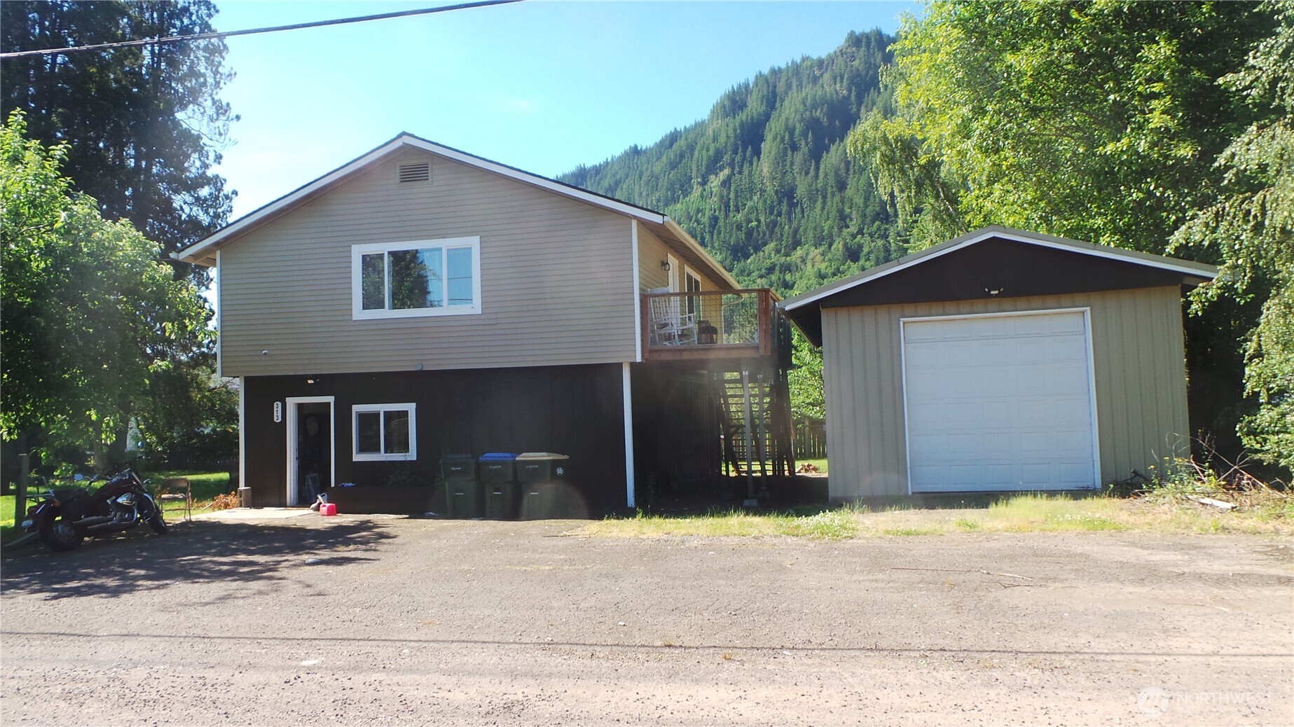 Updated home with a large detached shop on a generous lot in Morton. The home offers comfortable living spaces, updated finishes, and scenic mountain views. The versatile shop is ideal for mechanics, woodworkers, hobbyists, equipment storage, or a home-based business (buyer to verify permitted uses). Producing apple, peach and pear trees. Plenty of parking for vehicles, RVs, and recreational equipment. Enjoy the best of Pacific Northwest living with nearby lakes, rivers, hiking trails, and year-round outdoor recreation.
