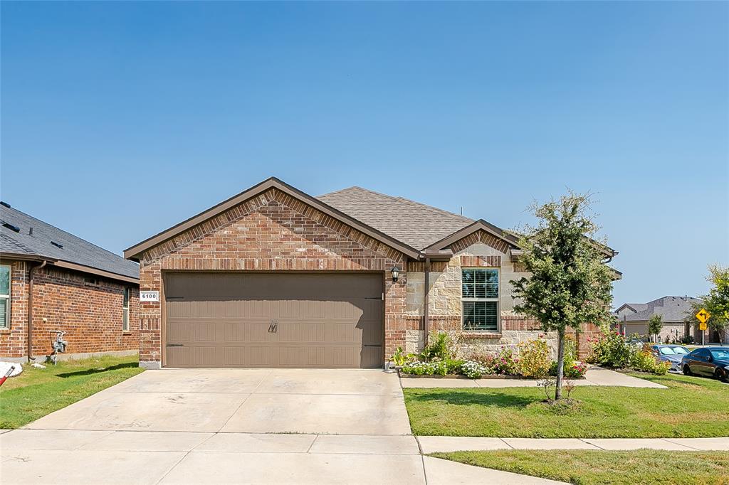 Welcome to your new home in a highly desirable, family-friendly neighborhood in North Fort Worth! This spacious 5 bedroom, 2 bathroom residence is perfectly situated on a corner lot offering enhanced privacy and curb appeal.  Walkable to the highly rated schools in Eagle Mountain Saginaw ISD.  Step inside to find an inviting, open concept floor plan filled with natural lighting.  An open concept, bright, eat-in kitchen features ample counter space, with stainless steel appliances, granite counter tops and a gas range. The spacious living area creates the perfect space for gathering.  Five generously sized bedrooms provide plenty of private space for a growing family, guests or a dedicated home office.  The primary suite offers a peaceful retreat with en-suite bathroom. Enjoy the benefits of the covered patio with the expansive corner lot offering extra yard space proving a great setting for outdoor activities and entertaining. Enjoy the perks of the community pool and picnic area.  The neighborhood also provides easy access to local shops, restaurants, and entertainment options that North Fort Worth has to offer.