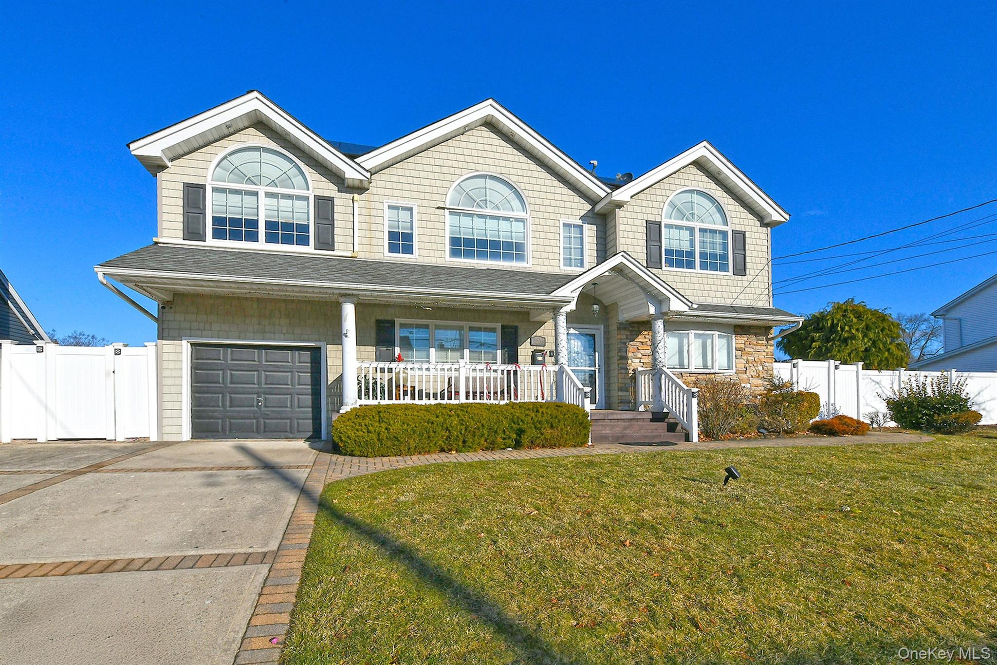 Welcome Home To This Custom Built Colonial ! Designer Windows in this South Facing Home Fill the Home with Sunlight! Feel at Home on Your Front Porch.  The Buyer  Who is Looking for a Spacious Home with Plenty of Extra Room for Lots of People, Look No More! 10 Rooms 6 Bedrooms, 4 Full Baths, Main Level Features Oversized Living Room with French Doors to a Manicured Yard & Paver Patio, Formal Dining Room, Updated Kitchen, Stainless Steel Appliances, Granite Countertops, Gas Cooking,  Possible Main Level Family Room or Larger Formal Dining or Additional Bedroom,  Main Level Full Bath, Additional Main Level Bedroom or Home Office. 2nd level Shows a 2nd Living Room/Family Room with Electric Fireplace, Cathedral Ceiling, Primary King Size Plus Bedroom Cathedral Ceiling Walk-In Closet, 4 Piece Full Bath. 3 Additional Spacious Bedrooms and a Full Bath with Tub, Full Basement Covered Outside Entrance, Updated GAS FurnaceSpacious Fun Yard Great for Entertaining, Shed, Convenient to all LIRR, Highways and Shops.