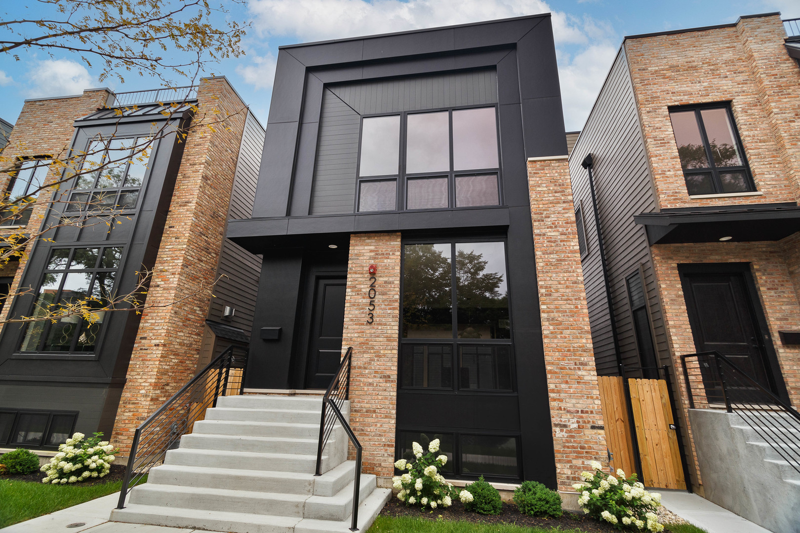 Don't miss your opportunity to check out The Race Collection, an exceptional 7-home new construction project in West Town! Contemporary facade with clean lines and brick accents. Extra wide floor plan with high end fixtures and finishes. Modern, sun filled spaces with oversized windows. Open concept main-level perfect for entertaining. Combined living/dining area features direct vent gas fireplace with floor to ceiling surround. Chef quality kitchen includes top of the line Sub-Zero and Wolf appliances, custom cabinetry with quartz countertops, and  large island with bar seating. Expansive family room with second gas fireplace and a wall of back windows. Upper level primary suite with two WIC's and ensuite bath featuring a freestanding tub, frameless glass shower, dual sinks, and heated flooring. Two additional bedrooms, full bath with tub and dual sinks, and laundry with LG washer/dryer complete the level. Third floor wet bar opens to a roof deck with outdoor fireplace. Finished lower level features radiant heated flooring and includes a spacious recreation room complete with wet bar, fourth bedroom with large WIC, full bath with shower, utilities, and luxury vinyl plank flooring. Rear deck with staircase to garage roof deck with pergola. Prime West Town location close to restaurants, shopping, entertainment, and Smith Park! Easy access to public transportation and other great neighborhoods.
