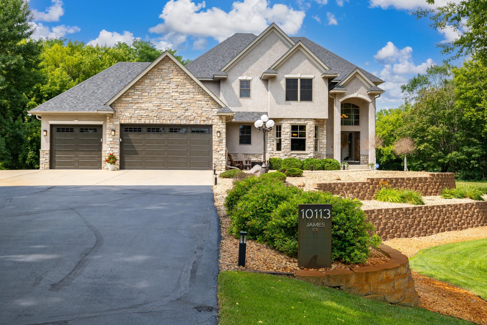 Stunning 5BR/4BA home on a 1-acre lot in Otsego with 3-season views of the Mississippi River and access to an association-owned parcel along the shoreline. Main level features 9’ ceilings, hardwood floors, sunroom, office with glass French doors, and main floor laundry. Updated kitchen with granite countertops, Viking & KitchenAid appliances, and access to a large composite deck with stairs to patio and walkout basement. Spacious living areas with fireplaces in both the main living room and sunroom. Walkout lower level includes in-floor heat, beverage bar, and wine fridges ideal for entertaining. Immaculate 3-car garage with epoxy floors, heat, and A/C adding over 700 sq/ft of additional living space, not included in total finished sq/ft. Major updates include new roof and stucco (2025), water heater (2024), and Carrier 3-zone HVAC (approx. 7 years) with Reme Halo UV air purification. Full Finken water filtration system (softener, iron filter, UV). Smart home features include Lutron Caséta lighting, Google Home integration, ADT security, and smart smoke detectors. Rare opportunity for luxury living with privacy, upgrades, and river views. 10 minutes from Albertville Outlets & New Albertville Costco, just 20 minutes from Maple Grove, and an hour to MSP.