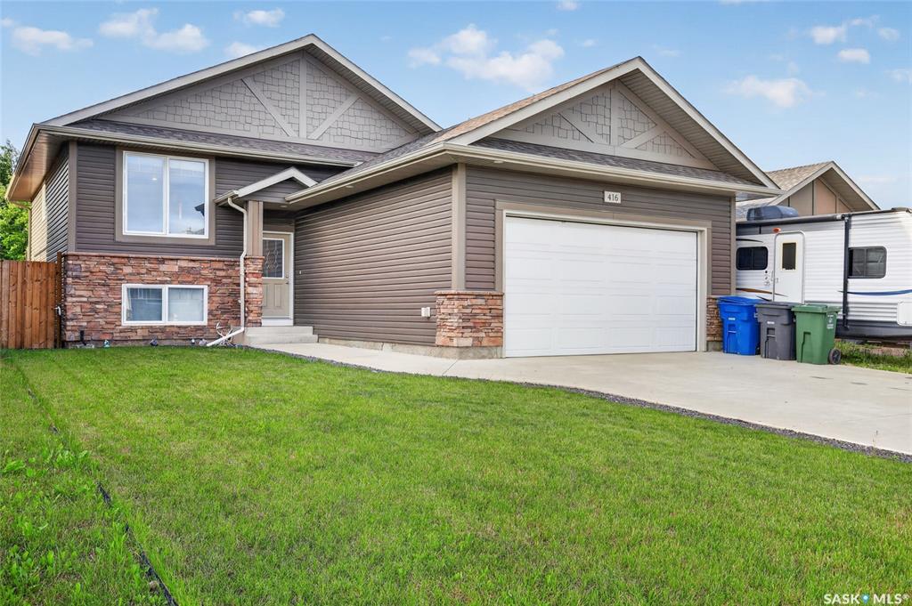 Completely developed 5 bed, 3 bath home in the quiet town of Dalmeny.  This home is completely move in ready and finished up, down, in and out.  The main has 3 bedrooms, including a primary suite with a 3 pc ensuite.  The basement was recently developed with two more bedrooms, a third bathroom and a large open family room.  The yard is fully fenced with a two tiered deck.  The double attached garage has direct entry and is heated.  In the front of this home there is a large concrete drive, RV parking and underground sprinklers.  Other features include central air and a recently replaced 50 gallon water heater.  There will be a presentation of offers Friday August 7th at 6:00pm