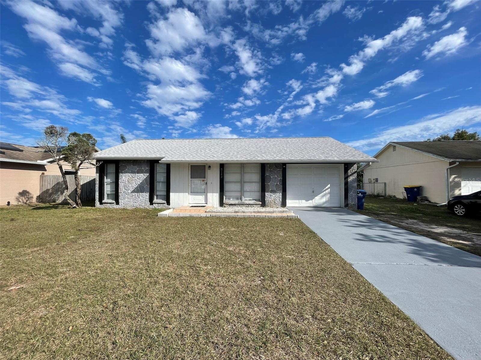 One or more photo(s) has been virtually staged. Charming Canal-Front Home in New Port Richey!Welcome to 3142 Ludlow Drive, a well-maintained 2-bedroom, 1-bath block home offering coziness and waterfront views. This 806 sq ft residence features tile flooring throughout, making it easy to maintain, and perfect for Florida living.Major updates are already done, including a roof replaced in March 2022, HVAC system installed in 2015, and a brand-new water heater in 2024—giving buyers confidence and value from day one.The kitchen and living areas flow nicely, while the screened-in back porch provides a relaxing space to enjoy views of the canal, ideal for morning coffee or evening unwinding. The home also includes an extra long one-car garage with laundry inside for added convenience.Situated in a quiet neighborhood in New Port Richey in the desirable 34655 zip code, this home is perfect as a primary residence, seasonal getaway, or investment opportunity for landlord. With solid construction, thoughtful updates, and a peaceful water view, this property is waiting for you.Schedule your showing today and experience easy Florida living!