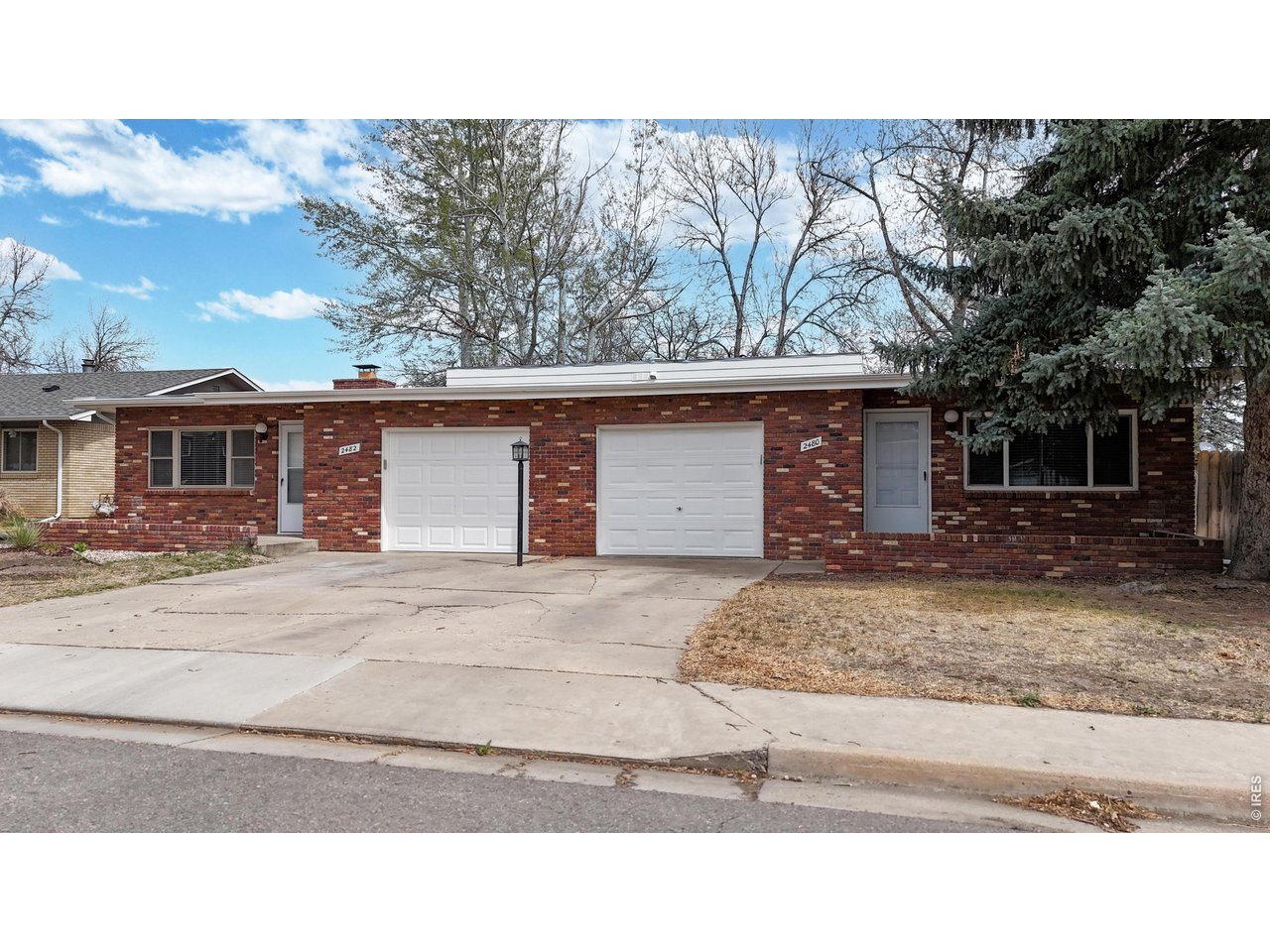 Fantastic investment or owner-occupant opportunity in the heart of central Loveland! This well-maintained whole duplex offers two spacious units, each featuring 3 bedrooms and 2 bathrooms. Inside both units, you'll find a sprawling main living area with a comfortable, functional layout. Enjoy separate dining and living rooms, perfect for entertaining or everyday living, along with a cozy brick fireplace that adds warmth and charm. The bedrooms are generously sized, providing plenty of space for relaxation and privacy. Each unit is thoughtfully designed with its own side patio, a fenced backyard ideal for outdoor enjoyment, and a one-car attached garage for convenience. Backing directly to Silver Glen Park, this property offers beautiful green space right outside your door-perfect for recreation, pets, or simply enjoying the outdoors. With strong rental potential, desirable features, and a prime location, this duplex is a rare find and an excellent value in Loveland! Ask your real estate professional about the current tenant situation.