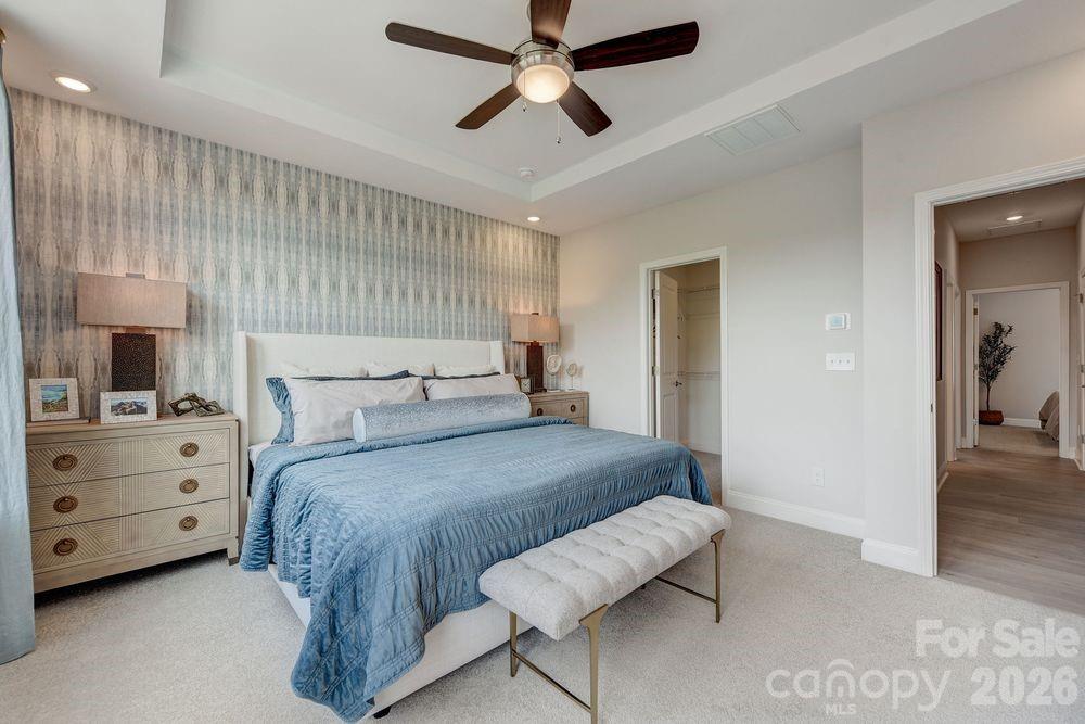 What's Special: Pond View | 1st Floor Guest Suite | 3-Story | White Cabinets. New Construction - May Completion! Built by America's Most Trusted Home Builder. Welcome to the Breckenridge II at 551 Silver Star Boulevard in Indian Trail Townhomes! This spacious 3-story townhome begins on the ground floor with a bedroom and full bath are located and the inviting foyer leads us upstairs to the main living space. The second floor features an open-concept layout with a large great room and deck, a well-appointed kitchen with a spacious center island, and a bright casual dining area with an adjacent powder room. The third floor includes three additional bedrooms, including a deluxe primary suite with dual sinks and vanities, a well-appointed shower enclosure, and a generous walk-in closet, along with the conveniently located laundry room and secondary bath. Welcome to Indian Trail Townhomes, where comfort meets convenience. Enjoy easy access to US-74 and I-485, top-rated Union County schools, and endless shopping and dining in Indian Trail and Matthews. Parks like Chestnut Square and Colonel Beatty are minutes away, with major employers, Atrium Health Union West, and popular retail centers all close by. Additional Highlights Include: first floor bedroom and full bath in place of flex and half bath, storage on second floor, shower ledge and double recessed niche at primary bath. Photos are for representative purposes only. MLS#4355782