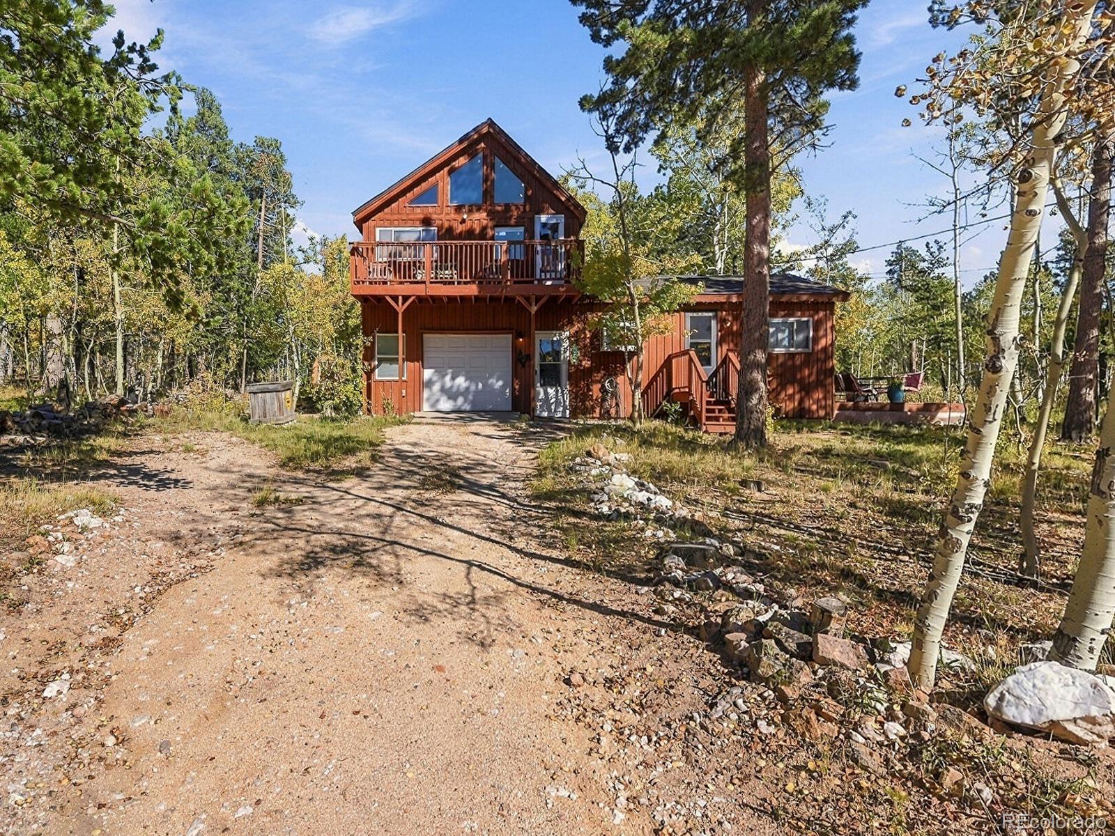 Experience the ultimate mountain retreat in Coal Creek Canyon! This enchanting home offers unparalleled access to the lively towns of Golden, Boulder, and Nederland, plus easy access to breathtaking hiking trails, national parks, and premier ski areas such as Eldora, Loveland, and Keystone.Set on a stunning one-acre lot, the property boasts an impressive landscape adorned with towering trees and striking rock formations. The first floor features a spacious kitchen, a full bathroom, and a delightful outdoor wood deck equipped with a hot tub—ideal for savoring the tranquil wooded surroundings. With a cozy wood-burning stove, you’ll enjoy warm, inviting nights.This charming two-story, one-bedroom home includes high-speed internet, natural gas, and waste pickup, plus an upper deck with partial mountain views. Two family-friendly restaurants are just minutes away, ensuring convenience and great nearby dining options.Seize the opportunity to make this peaceful haven your new home!