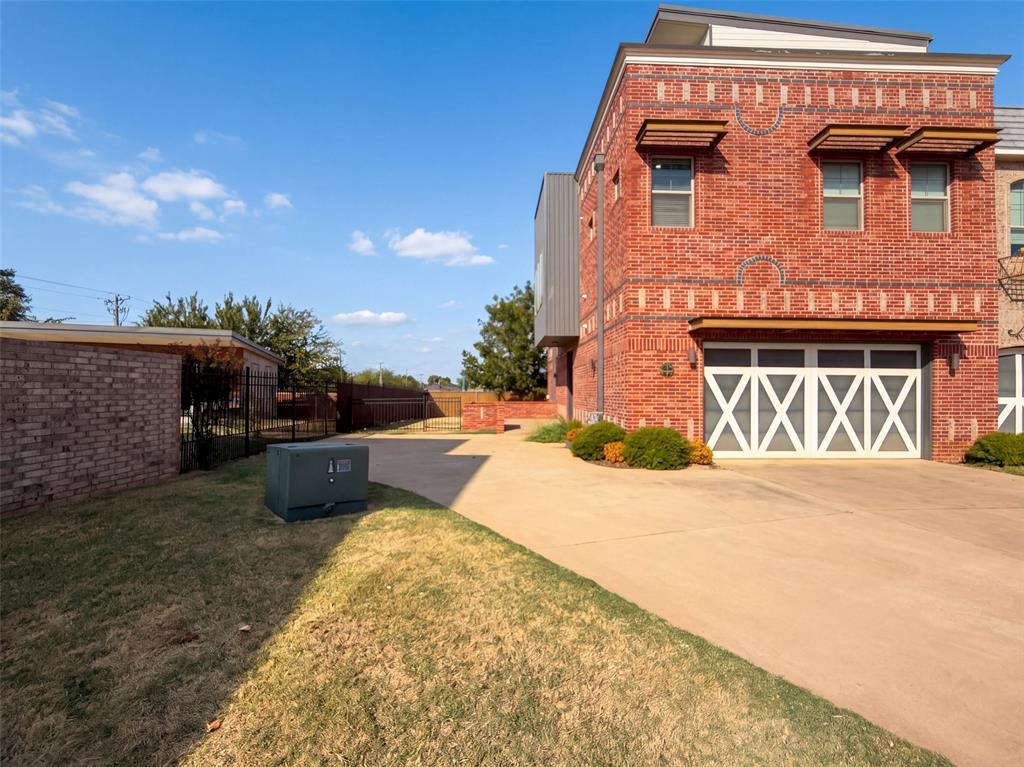 549 S Fretz Ave is a multi-level Edmond townhome built in 2014, with two bedrooms, two full bathrooms, one half bathroom and 2,098 square feet of living area per tax assessor. The kitchen includes an island and opens to the dining area. Both bedrooms and full bathrooms are on the second floor, with a half bathroom on the first floor. An attached two-car garage adds usable space beyond the interior. Included 100-Day Home Warranty with buyer activation.