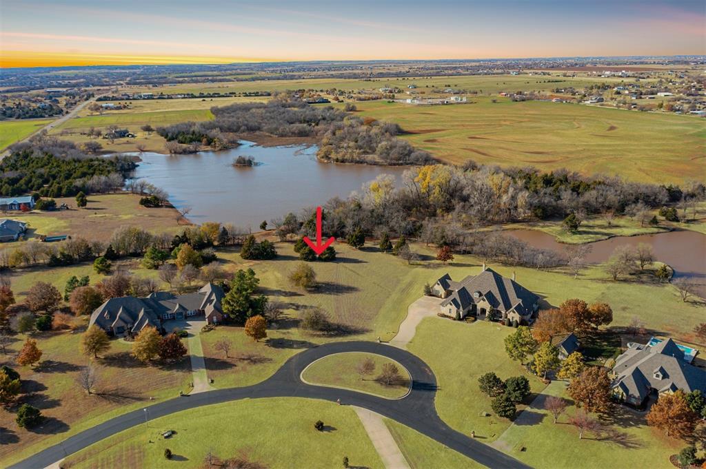 Discover an exceptional opportunity to build your dream home on this exclusive 2.17-acre (MOL) homesite in the prestigious Carlton Lakes community of Deer Creek at 18077 Caltron Way. This property offers more than just a place to live—it’s a lifestyle. Immerse yourself in the serene natural beauty of Carlton Lakes, a neighborhood thoughtfully designed to embrace family living and modern luxury. This exclusive development will feature high-end finishes and stylish material selections, ensuring an unparalleled standard of quality and elegance. With its scenic views and tranquil, rural-inspired setting, this homesite provides a peaceful retreat while maintaining the convenience of easy access to highways and the turnpike. The property requires a minimum build size of 2,800 square feet, allowing for a spacious and distinctive home perfectly tailored to your vision. Carlton Lakes is more than a neighborhood; it’s a destination. The gated entry ensures privacy and security, creating an inviting and exclusive atmosphere. Don't miss this limited opportunity to create your bespoke residence in one of Deer Creek's most breathtaking communities.