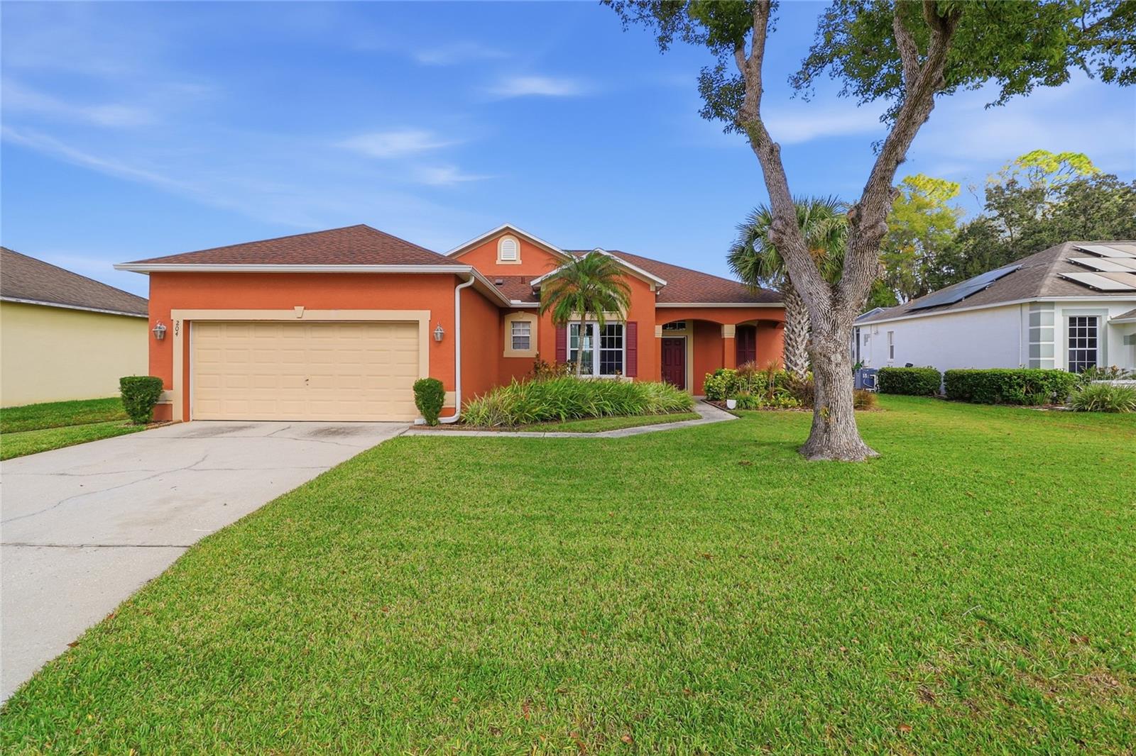 Welcome to 204 Golf Course Parkway, where comfort meets relaxed Florida living. This beautifully maintained home offers a bright, open layout filled with natural light and designed for both everyday living and entertaining. The warm, inviting kitchen serves as the heart of the home, featuring quartz countertops, ample cabinetry, and a functional layout perfect for cooking, gathering, and hosting family and friends. Beautiful tile flooring flows throughout, providing timeless style and easy maintenance, while fresh interior paint creates a clean, airy feel throughout the home. Living and dining areas are thoughtfully designed to feel both spacious and cozy ideal for quiet evenings or lively get-togethers. Bedrooms offer peaceful retreats with comfortable layouts, while bathrooms are well-appointed for everyday ease. Step outside and enjoy the Florida lifestyle with space to relax, entertain, or take in the surrounding golf course setting. Whether sipping morning coffee or unwinding at the end of the day, the outdoor space complements the home’s inviting interior. Conveniently located near golf, lakes, shopping, dining, and local attractions, this home blends tranquility with easy access to everyday amenities. This home offers comfort, style, and location making it a wonderful place to call home. Request a private tour today.