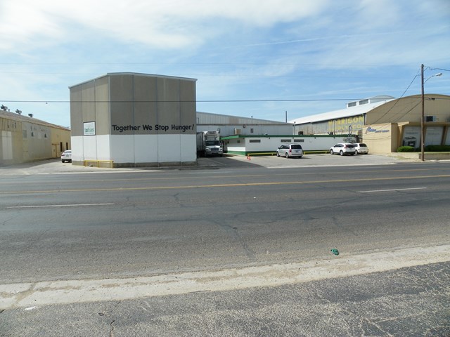 OFFICE HAS APPROX 2935 SF WITH SIX OFFICES, SHOP HAS APPROX 16,576, EVE HEIGHT 16' X 20', 2 OVER HEAD DOORS 2 IN BACK AND 1 INFRONT  WIDTH 8 X 10, HIGH LOADING DOCK 8 X 10 DOORS.  Lease $7,00.00 per month plus triple net.