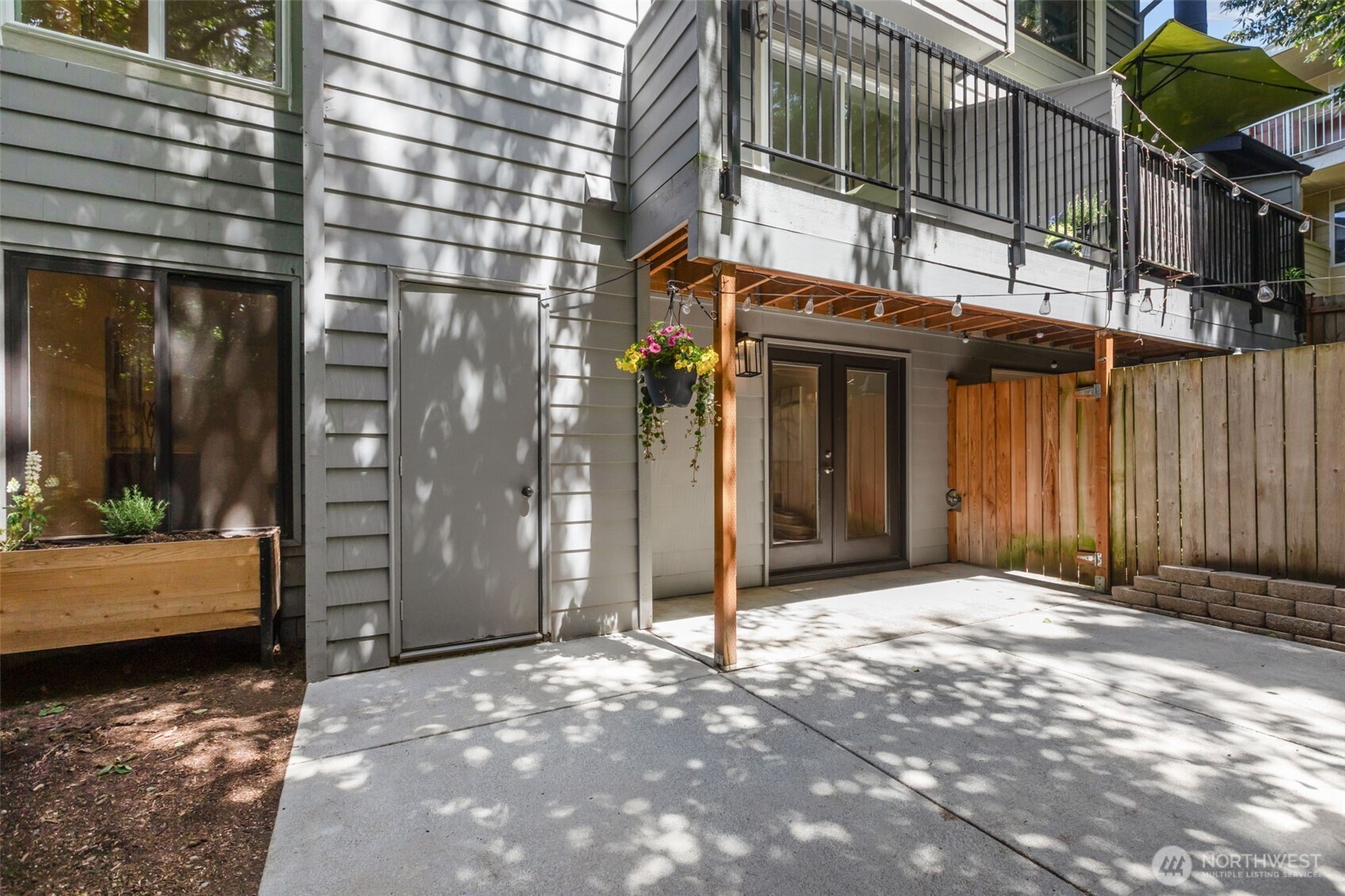 Welcome home to this beautifully refreshed 3-level townhome-style condo nestled in a small, intimate complex — where privacy, peace, and turnkey living come together. Located in the end building of the complex, you'll enjoy minimal foot traffic and a quiet, tucked-away feel, with a serene greenbelt backdrop that makes every day feel like a retreat.Step inside to discover brand new everything — fresh LVP flooring flows through the main living areas while plush new carpet adds warmth to the bedrooms. Every room has been freshly painted, and the upgraded bathrooms shine with modern finishes. The kitchen features a new range, and with a new roof and new windows throughout, the big-ticket items are already done for you.The thoughtful 3-level layout offers true flexibility. The main living area is bright and welcoming, while the lower level bonus room — with its own walkout to a fully fenced garden patio — is perfect as a guest suite, mother-in-law space, home office, or hobby room. Step outside to your private, fully fenced patio and breathe in the quiet — the greenbelt behind provides a lush, natural buffer from the rest of the world.Whether you're a first-time buyer, downsizer, or savvy investor, this move-in ready gem is the one you've been waiting for. Seller will pay the monthly HOA dues through the end of the year. Just unpack and enjoy!