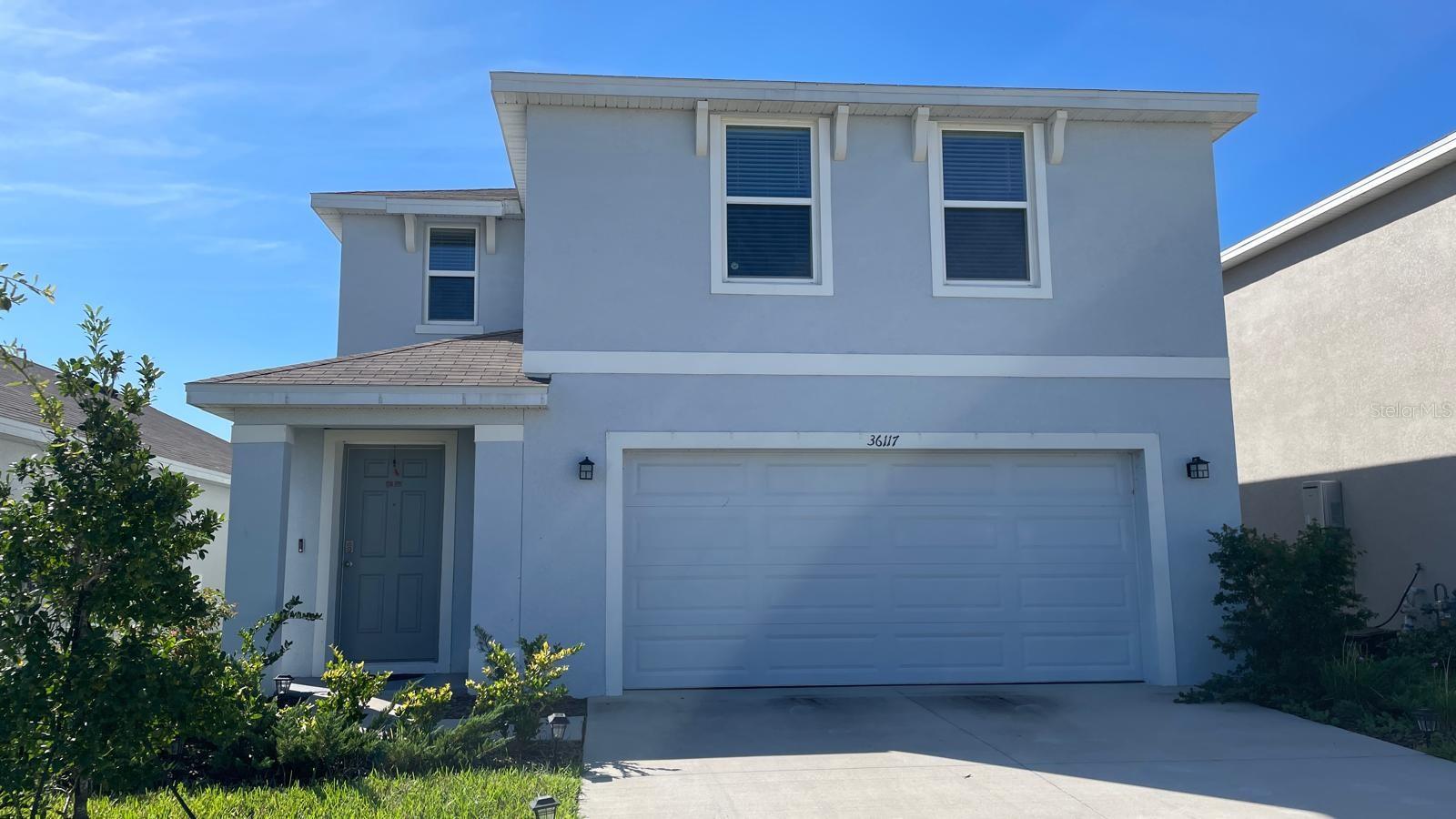 Welcome to this beautiful 2025-built D.R. Horton home in Zephyrhills! This spacious two-story, north-facing home offers 4 bedrooms, 2.5 bathrooms, and approximately 2,305 square feet of thoughtfully designed living space. Enjoy the benefits of newer construction with a modern layout, comfortable living areas, and plenty of space for family and guests. The fully fenced yard provides added privacy and is perfect for outdoor activities, pets, or entertaining. Conveniently located near Wiregrass Ranch and Wiregrass Town Center, Costco, shopping, dining, entertainment, and US-301. Orlando Health Zephyrhills Hospital is also nearby for added convenience. With easy access to major roadways and everything the surrounding area, this home is an excellent opportunity to enjoy a newer Florida home in a convenient and growing community. Schedule your showing today!