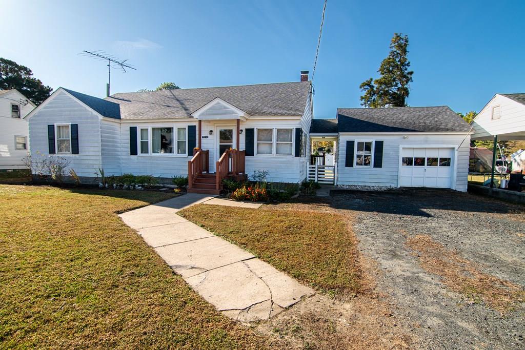 Charming 3-bedroom ranch-style house in the heart of Exmore, featuring a newly renovated kitchen, an additional room perfect for an office, a detached garage, and two sheds with plenty of storage space. The fenced-in yard includes several garden beds with producing peach trees, raspberry and blueberry bushes—truly a gardener's dream!
