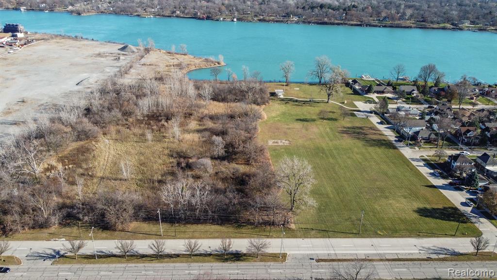 Remarkable property just a short distance to Downtown Trenton!  Nearly 20 acres with 541' of Water Frontage on the Trenton Channel with direct water access.  Many possibilities with this open canvas. 
This property is zoned W-R "Waterfront Revitalization" as described on City of Trenton's website.
W-R: Included commercial customer-serving uses such as
dining, retail, and offices., possibly multi-family.  Also generally limited industrial
uses to those permitted in the I-1 district, which are
already defined as those able to coexist with other uses in
the absence of a buffer zone.  Check with city of Trenton for clarification.  This property is irregular shaped, survey available upon request.  Road frontage 952 on W Jefferson, 1525 deep, 541' on the water. Corner of W Jefferson & Helen.  Property includes Tax ID #54011990004701 on Helen Ave. and is adjacent to Meyer Ellias Park THE PARK IS NOT FOR SALE