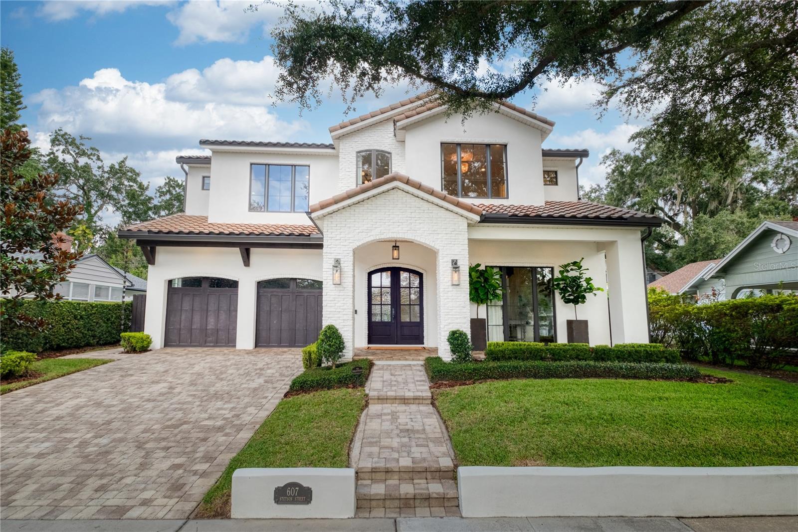 Under contract-accepting backup offers. One of the most stunning homes to hit College Park — beautifully sited on coveted Stetson Street and just a short, pleasant walk to Lake Ivanhoe, Edgewater Drive, Publix, Starbucks, and the neighborhood shops. Built by Lahr Homes in 2020 and impeccably maintained, this custom residence blends clean modern lines with warm, designer-driven details and high-end finishes throughout.

Step inside to an open, light-filled floor plan anchored by a show-stopping chef’s kitchen: oversized island, marble counters, farmhouse sink, and custom cabinetry — perfect for everyday living and entertaining. The home’s expertly curated palette continues through the great room and dining area with wide plank hardwood floors, abundant windows, custom lighting, and millwork. A main-level room ideal for an office or guest suite adds flexibility; upstairs, you’ll find generous bedrooms and a luxe primary suite with a thoughtfully designed bath and a large walk-in closet.

Outdoor living shines with a covered paver patio and built-in grill area that extends the entertaining footprint to the fully fenced backyard—plenty of room for a pool.  Every inch of this home was professionally designed and thoughtfully executed — it’s truly more beautiful in person.

Don’t miss this rare College Park opportunity on one of the neighborhood’s best blocks. It is true what they say, you really can have it all in College Park.