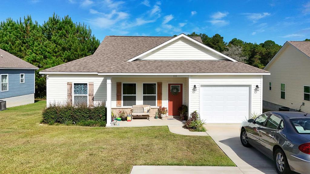 Welcome to 111 Marisa Court in Thomasville's desirable Grove Point subdivision. Built in 2021, this 3 bedroom, 2 bathroom home offers 1,338 square feet of comfortable living space with a modern layout. Situated on a .26-acre lot, the property is easy to maintain while still providing great outdoor space—including a large back deck overlooking the pond, perfect for relaxing or entertaining. Inside, you'll find a bright and inviting interior with an open flow between the kitchen, dining, and living areas. The primary suite offers its own private bathroom and large walk-in closet while two additional bedrooms and a full bath provide space for family or guests. A one-car garage adds convenience and storage. Located just minutes from shopping, dining, and everything Thomasville has to offer, this home combines a peaceful setting with unbeatable convenience. There is also a path to the adjoining Cassidy Road Park with its beautiful pond and well kept grounds. The park will also soon have a walking trail, fishing dock, pavilion, and disc golf course.