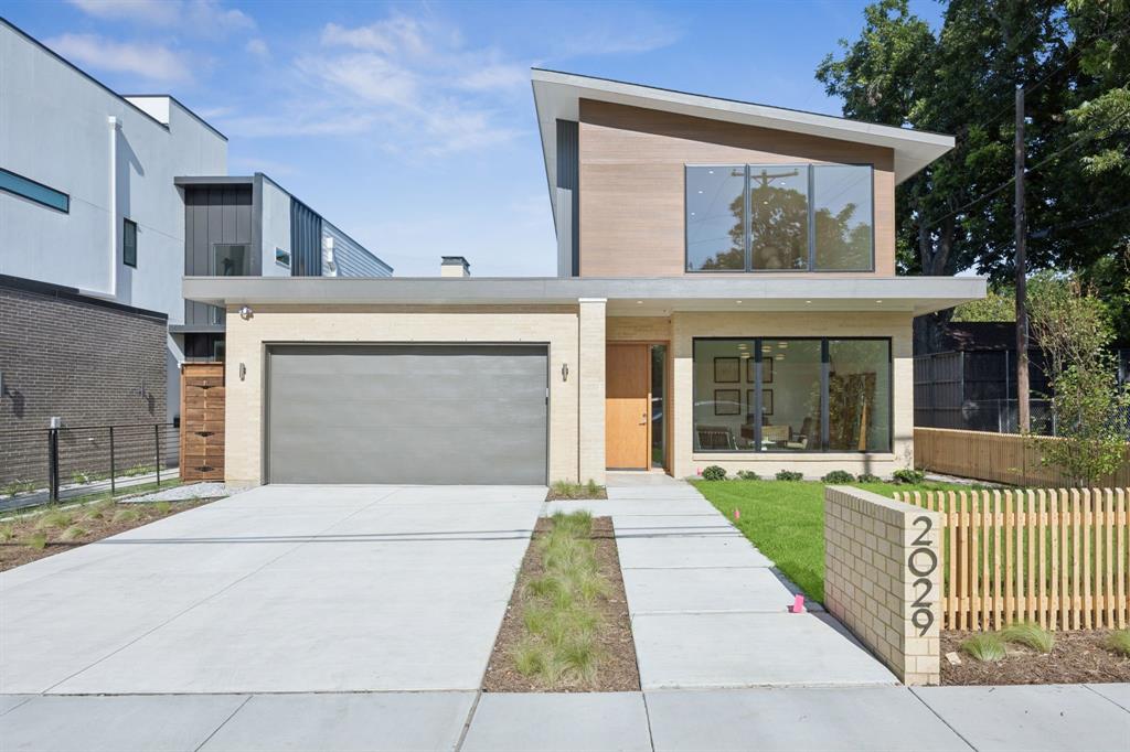 Modern elegance meets everyday comfort at 2029 Summit Ave in Dallas.
From the moment you pull up, this home draws you in with its clean lines, striking architecture, and warm curb appeal. Inside, you’ll find nearly 3,850 sq ft of beautifully designed living space, where every detail has been thoughtfully planned to blend style and functionality.
The heart of the home is the open kitchen and living area, perfect for gatherings big or small. A spacious walk-in pantry keeps everything organized, while large windows flood the space with natural light, making it feel inviting from sunrise to sunset.
Just off the main living area, the primary suite is truly a retreat. It’s generously sized, with a spa-like bathroom and a walk-in closet that’s hard to beat. Upstairs offers even more flexibility with a cozy family room and two additional bedrooms, each with their own private bath, ideal for kids, guests, or even a second home office.
Step outside to the covered patio and picture relaxed evenings or weekend barbecues. The yard is just waiting for your personal touch — a garden, a play space, or maybe that outdoor kitchen you’ve always wanted.
Additional highlights you’ll appreciate every day:
- A dedicated office on the first floor — great for working from home.
- Mudroom and large laundry that keep everyday life running smoothly.
- A spacious two-car garage plus plenty of storage throughout.
- Master bedroom on the first floor. 
Located close to Dallas’ best dining, shopping, and entertainment, this home gives you the modern lifestyle you’ve been looking for, without sacrificing comfort.
If you’re ready for a place that feels as good as it looks, come experience 2029 Summit Ave for yourself. It’s not just a house — it’s the start of your next chapter.