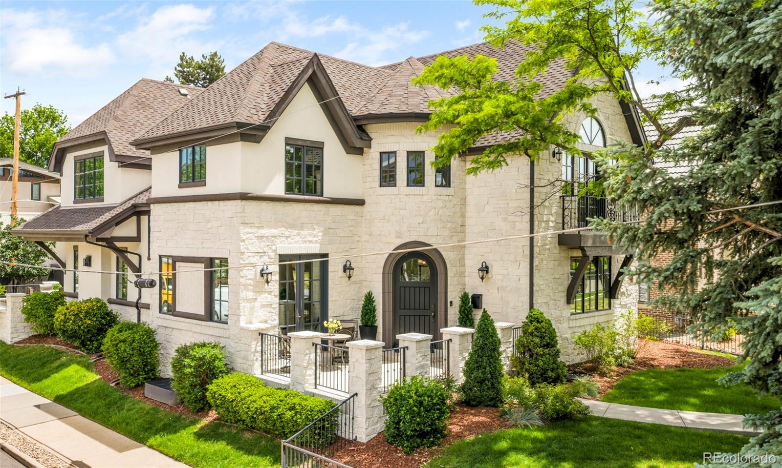 Perfectly positioned on one of Bonnie Brae's most desirable streets, this impeccably maintained and thoughtfully updated residence offers a rare opportunity to enjoy one of Denver's most coveted neighborhoods. Surrounded by mature tree-lined avenues, iconic architecture, and a vibrant sense of community, the home places residents just moments from the boutiques and acclaimed dining of Cherry Creek North, the recreational amenities of Washington Park, and downtown Denver's business and cultural districts. This home offers a large, fenced front yard perfect for entertaining and play, along with a private backyard — both easily accessed from the home via French doors.Inside, timeless elegance and modern sophistication converge. The recently renovated chef's kitchen features Sub-Zero and Wolf appliances and flows seamlessly to the formal dining room through a gracious butler's pantry, creating an ideal setting for both intimate gatherings and large-scale entertaining. A handsome study with fireplace and coffered ceiling provides a distinguished work-from-home retreat.The primary suite serves as a private sanctuary, highlighted by soaring vaulted ceilings, French doors opening to a secluded balcony, and a luxurious spa-inspired bath. Generously proportioned secondary bedrooms, beautifully appointed living spaces, and exceptional attention to detail throughout create a home that is equally comfortable and refined.Outdoor living is equally impressive, offering private spaces to relax, entertain, and enjoy Colorado's renowned climate. Combining a premier Bonnie Brae address with impeccable updates and effortless access to Denver's finest shopping, dining, parks, and private schools, this exceptional residence embodies the very best of luxury living.