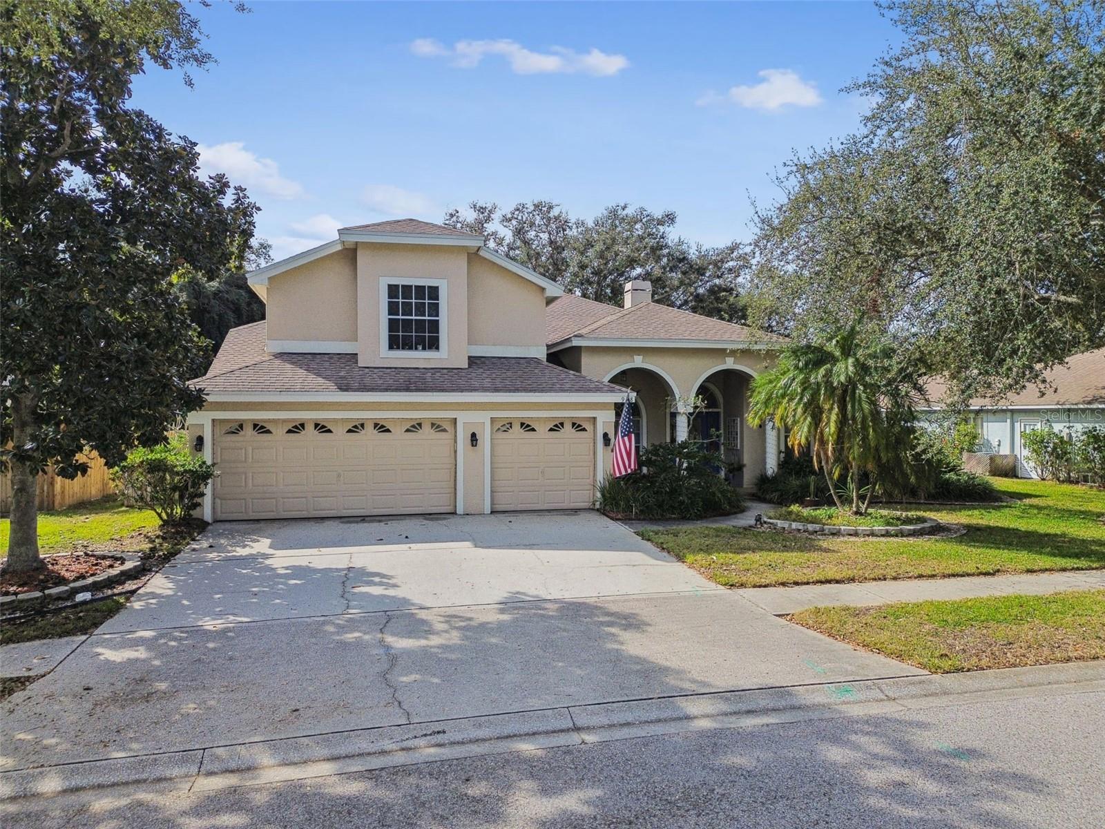Welcome to this exceptional custom-built residence offering 3,137 square feet of living space, ideally located in Tarpon Springs near top-rated schools, neighborhood parks, Gulf beaches, and the Tarpon Springs Golf Course. Situated on just over 0.3 acres with no rear neighbors, this home delivers privacy, space, and flexibility in a highly desirable setting. The thoughtfully designed split floor plan includes 4 bedrooms and 4 full bathrooms, providing comfort and separation for family and guests. A dedicated home office supports remote work or study, while a large upstairs loft and separate hobby room offer versatile spaces for recreation, media, or creative use. The recently remodeled kitchen serves as the heart of the home and is well appointed with black stainless steel appliances, a gas cooktop, a prep sink, and a large kitchen island with built-in storage, making it ideal for entertaining and everyday living. Adjacent living areas are anchored by a dual gas and wood-burning fireplace, adding warmth, ambiance, and flexibility. Recent improvements include a new gas water heater and fully paid-for solar panels, delivering enhanced energy efficiency and long-term utility savings. Step outside to a private backyard retreat featuring a swimming pool and pool pavers remodeled in 2025, surrounded by generous outdoor space. Gas lines are already extended to the pool area, making the property well prepared for a future custom outdoor kitchen—all with the added benefit of no rear neighbors. With custom construction, significant upgrades, a functional and flexible layout, and a sought-after Tarpon Springs location, this home offers an outstanding opportunity for comfortable and efficient Florida living.