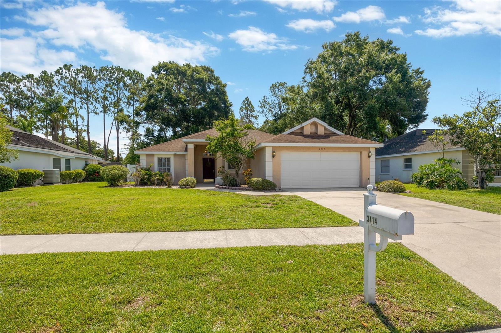 Welcome Home! Come see this lovely 3 bedroom 2 bathroom home in the fantastic neighborhood of Walden Lake in Plant City. The friendly curb appeal will greet you and instantly make you feel right at home. Upon entry, the soaring high ceilings & open floor plan with expansive living area allow for natural light to spill in from every angle creating a homey feeling. The spacious family room provides a wonderful space to entertain, enhanced by the glass sliders providing easy access to the screened porch & lovely backyard views. Enjoy preparing family dinners in the adjoining generously sized kitchen, with breakfast nook, a closet pantry, breakfast bar ~ perfect for entertaining or everyday life. The primary bedroom suite has a walk-in closet & ensuite bath with two dual sinks and a walk in shower. The secondary bedrooms are nicely sized with ample closet space. The 20' x 10' large screened lanai provides a wonderful spot to relax & enjoy your morning coffee or weekend bbq overlooking the large backyard, with lots of room to play for family, friends & pets. Walden Lake is a beautiful community conveniently located between Tampa & Orlando, ideal for quick commutes to work, beaches, amusement parks & more. Escape the hustle and bustle to discover the allure of historic Plant City. Enjoy an active lifestyle with community amenities including walking trails, large lake w/fishing dock, playground, recreation fields & dog park. Schedule your showing today!